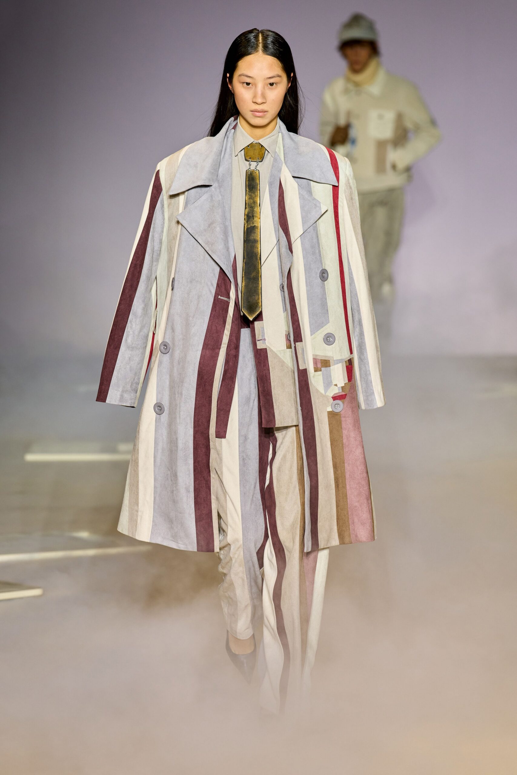 multi-colored coat with striped pants