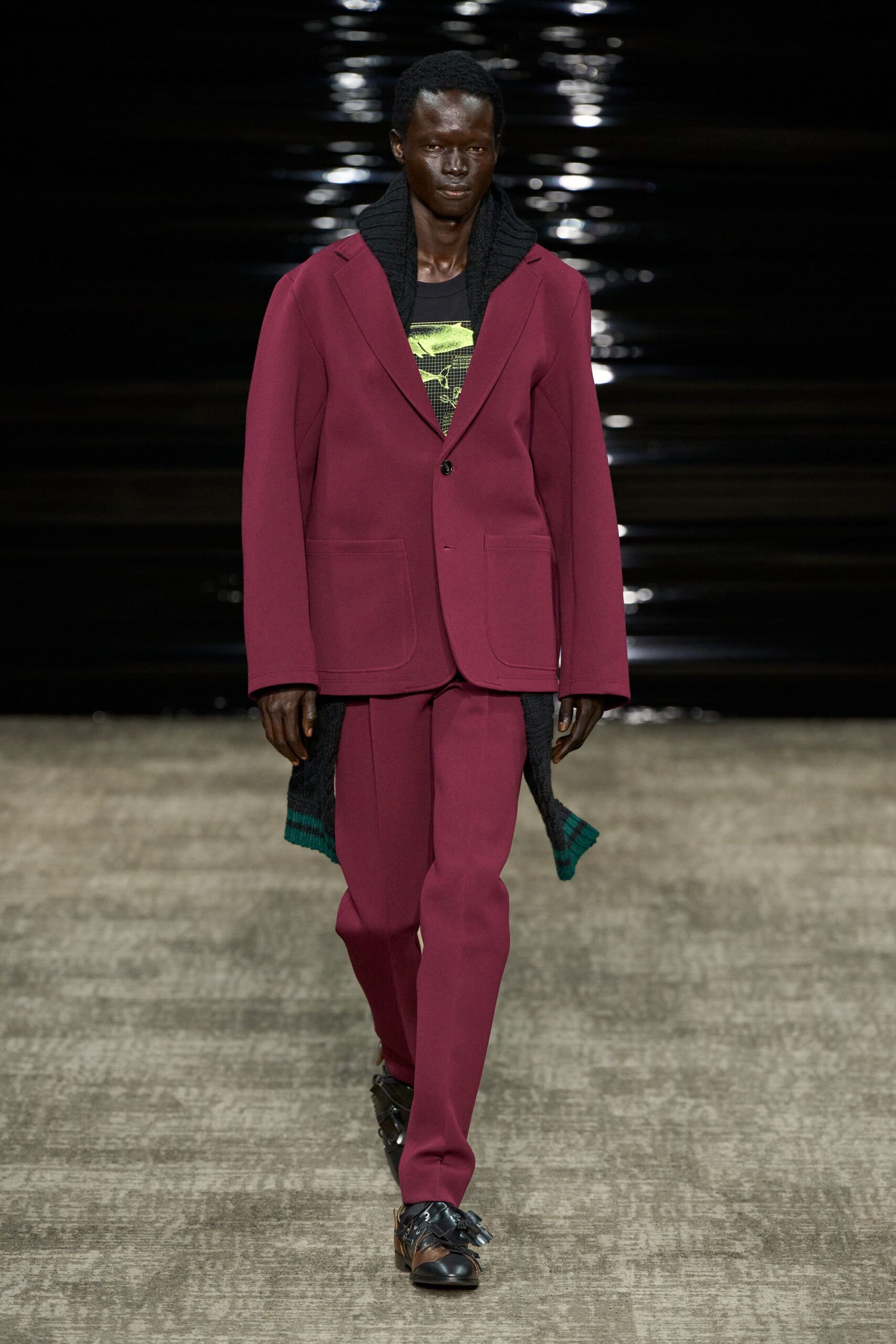 maroon tailored suit with green top