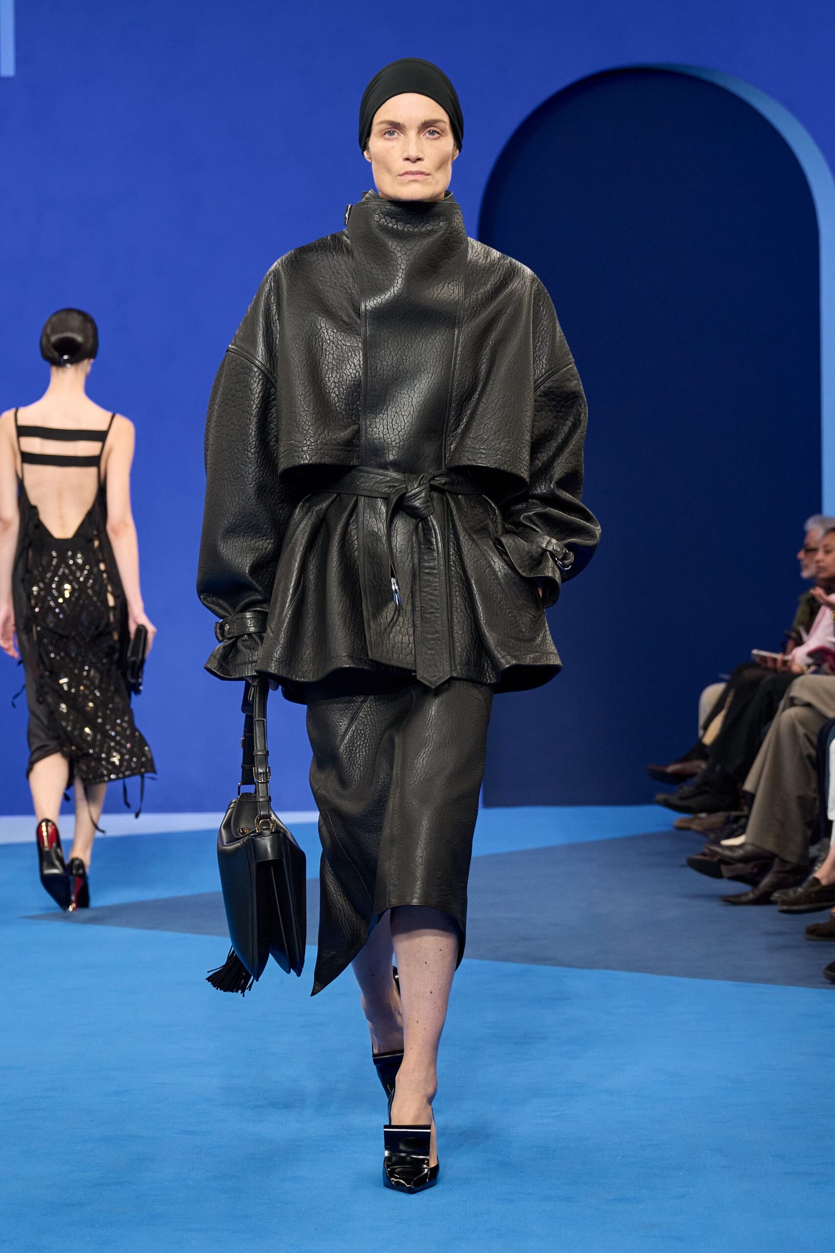 black leather long-sleeve collared oversized belted midi coat