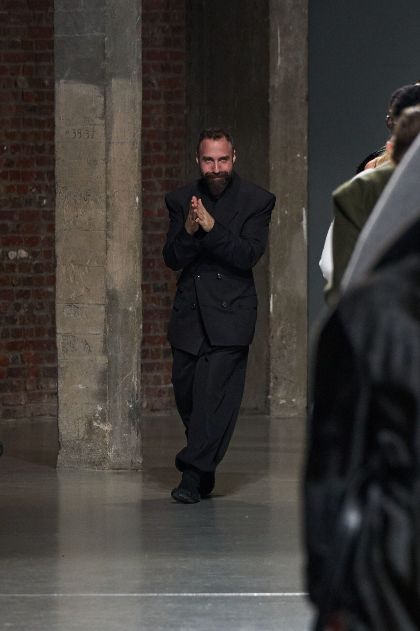 black wool long-sleeve collared structured buttoned suit