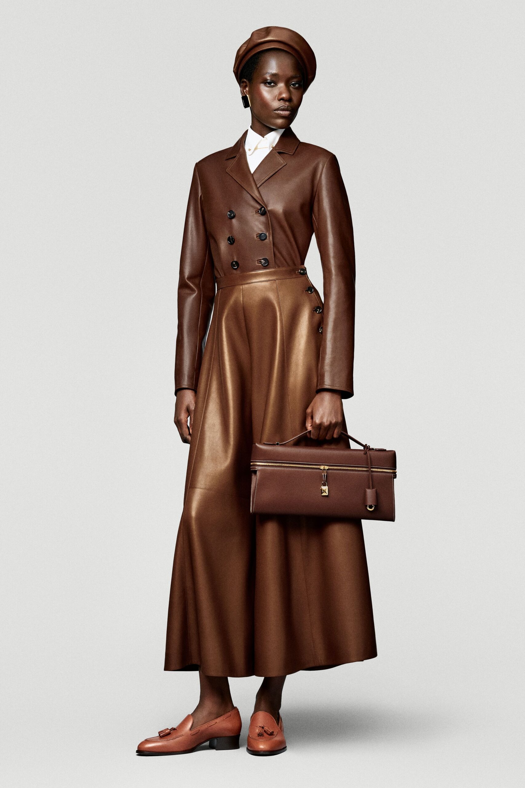 brown leather asymmetric fitted high-waisted flared maxi skirt