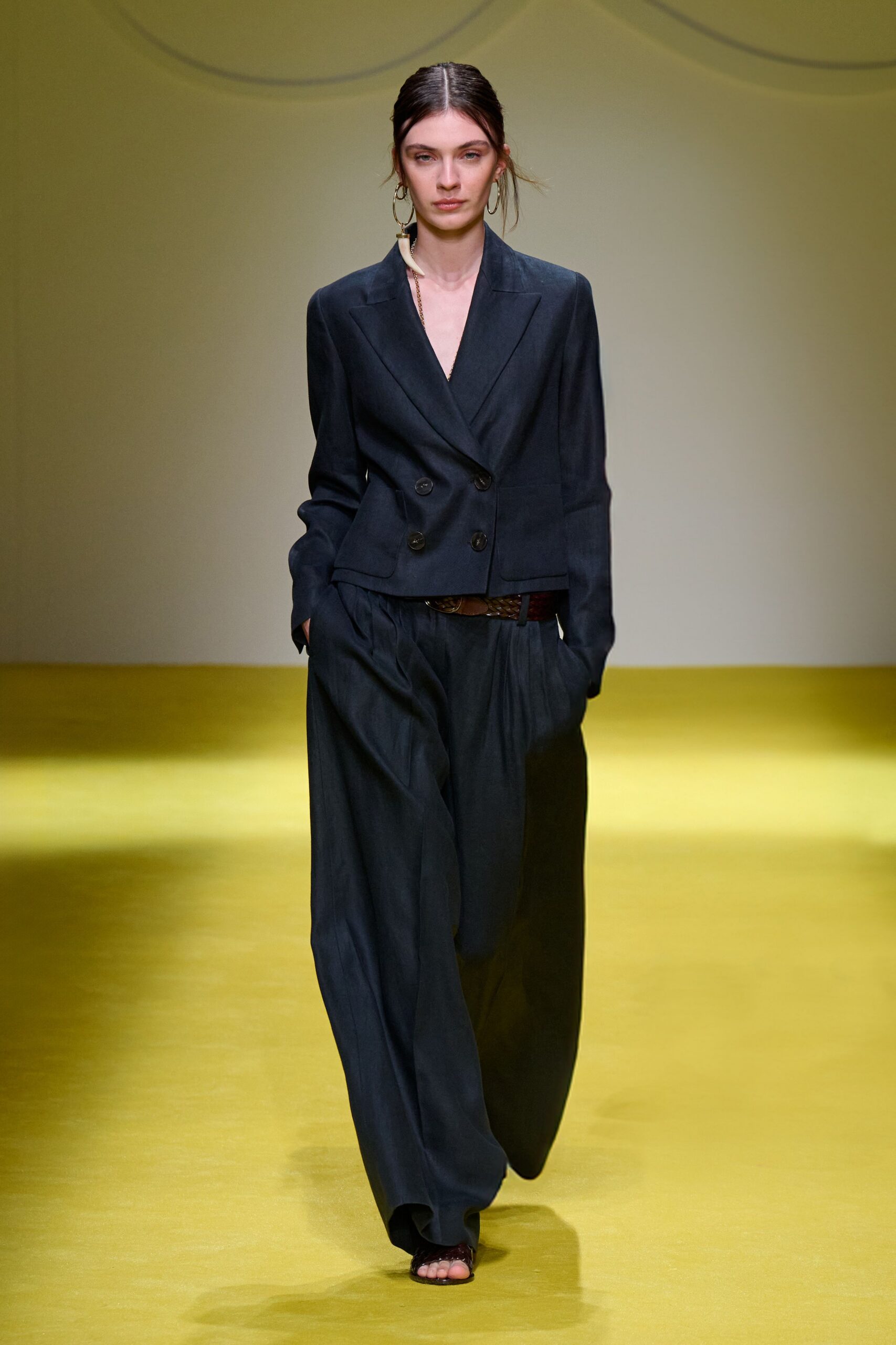black tailored blazer and relaxed pants