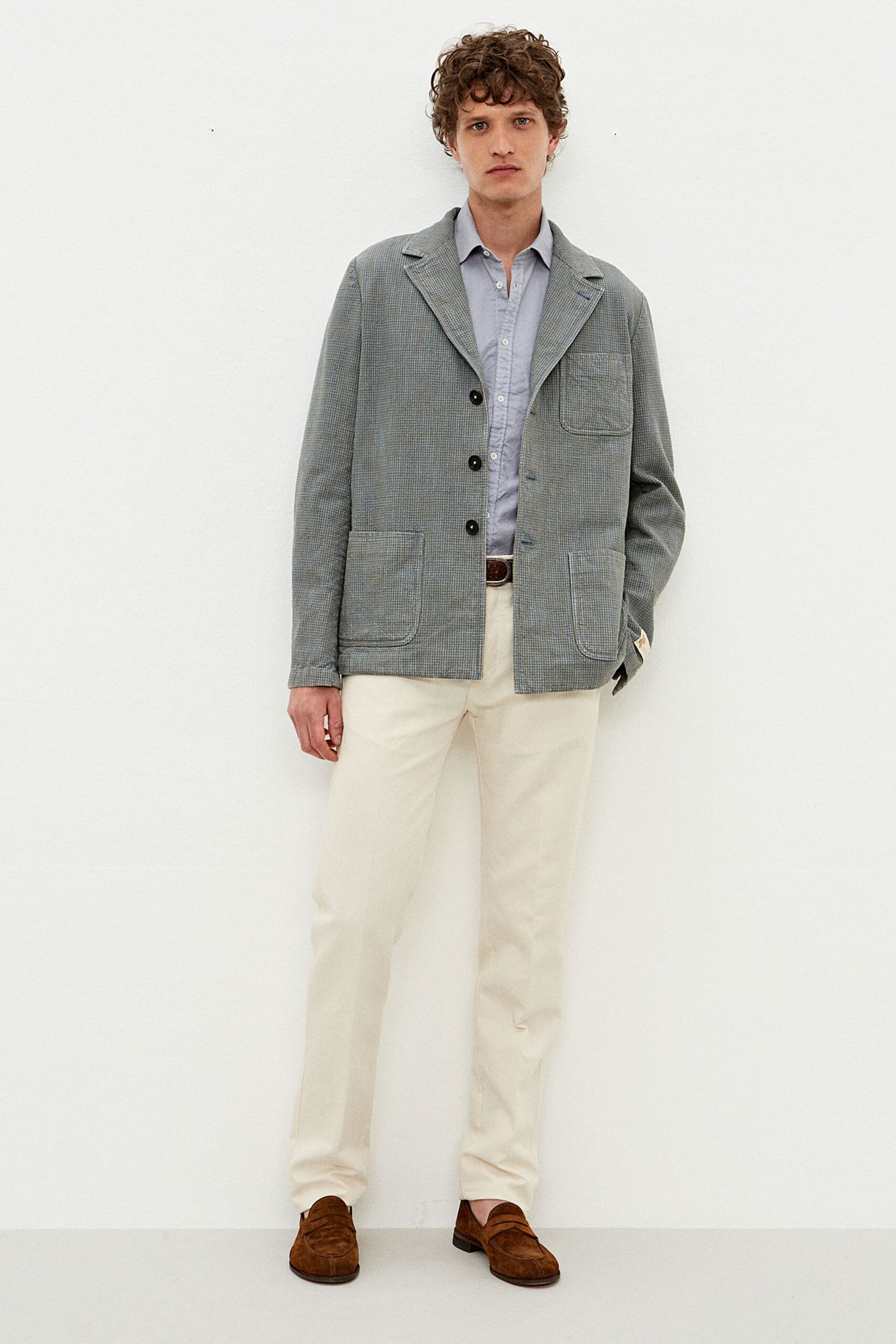 blue cotton jacket gray shirt white pants brown shoes