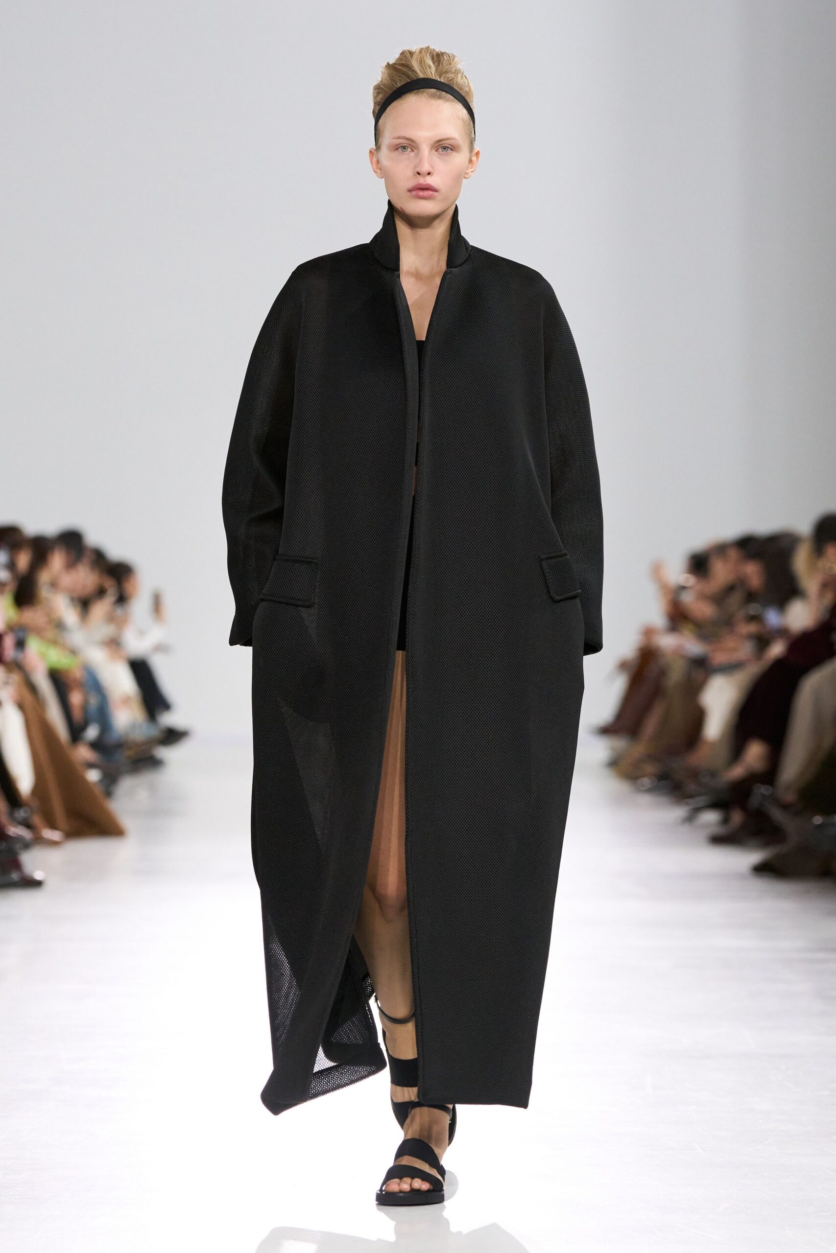 black cotton long-sleeve collared oversized buttoned maxi coat