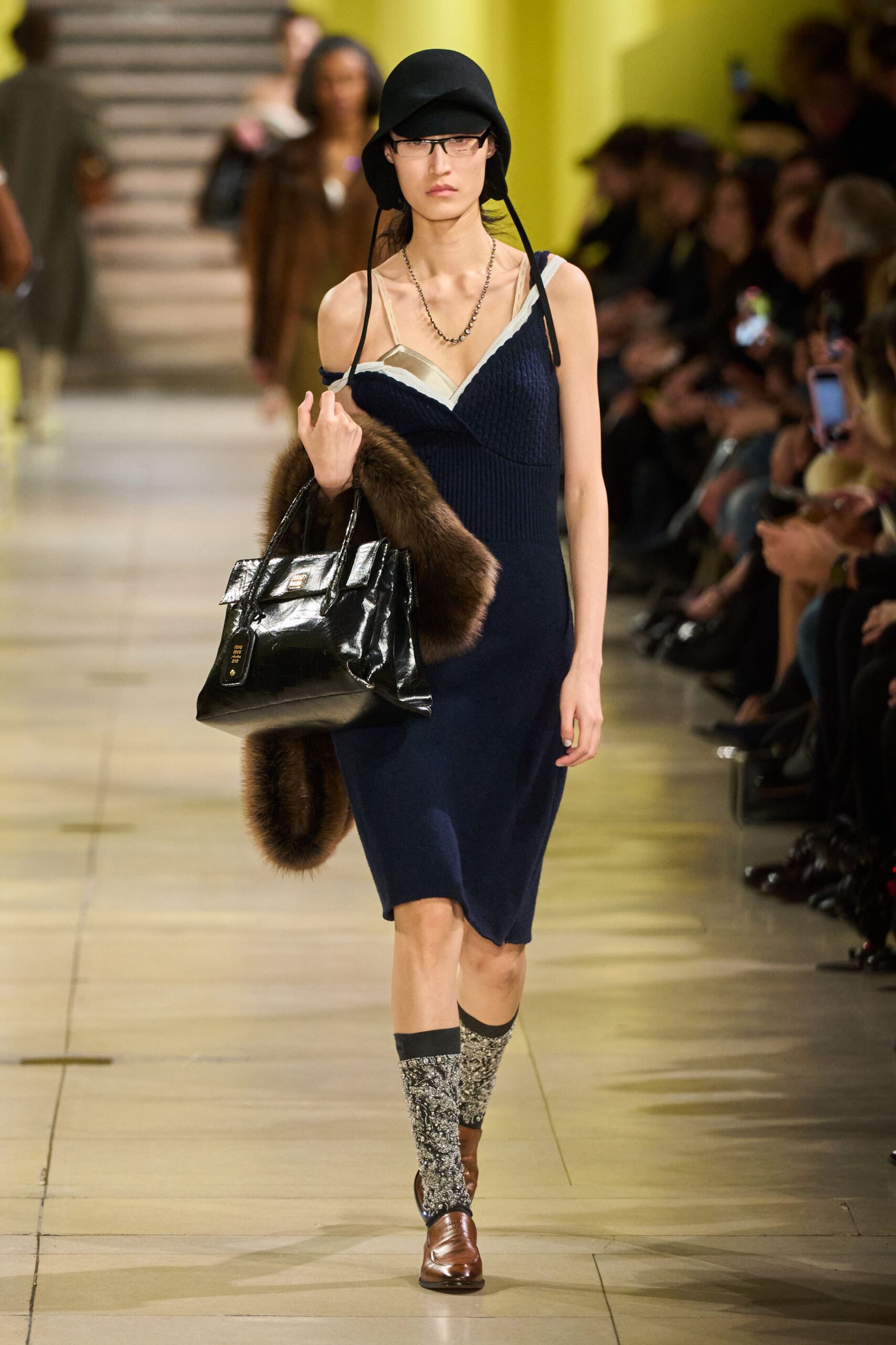 blue fitted sleeveless dress with hat