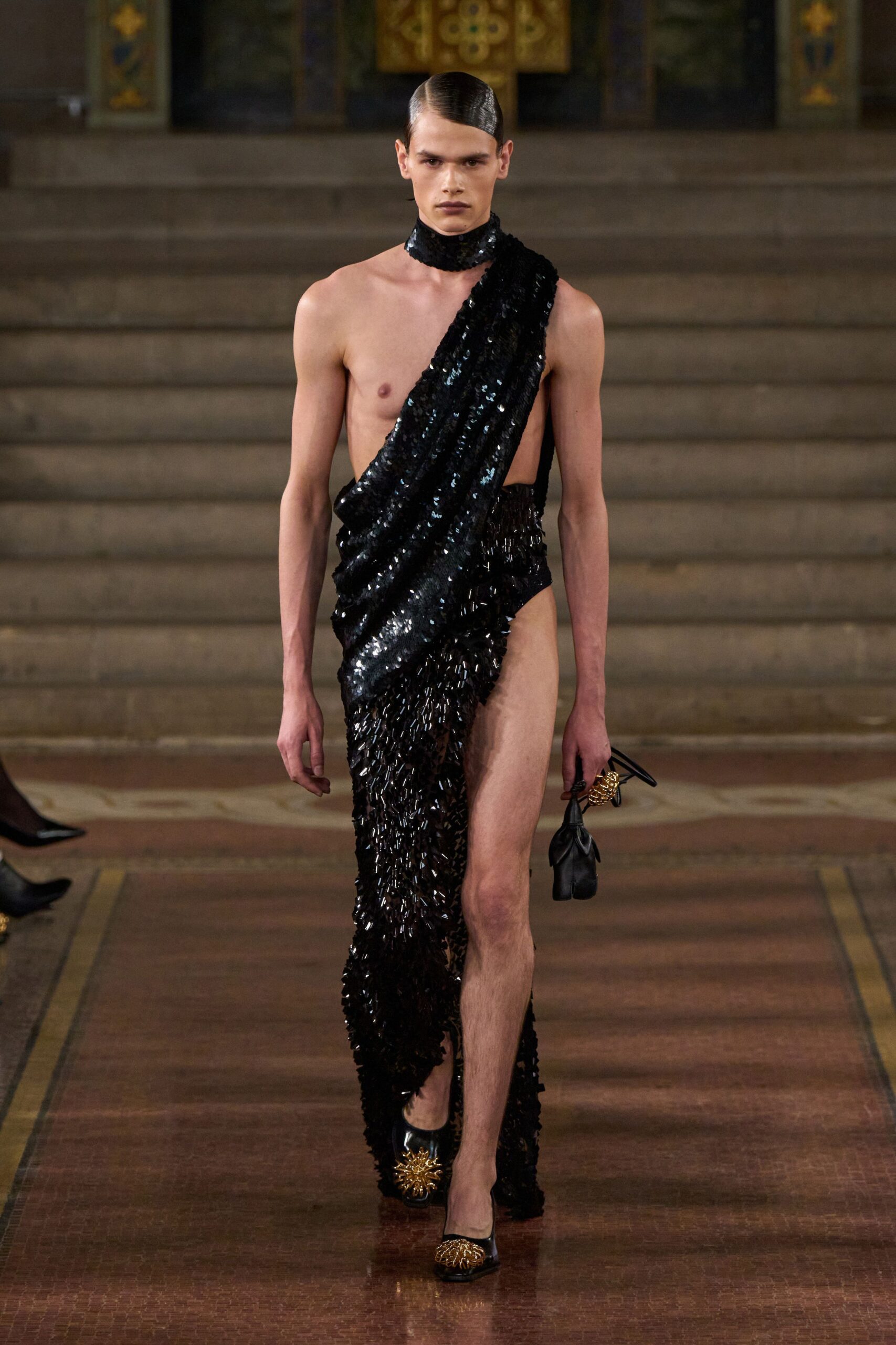 black sequin asymmetric gown with shoes