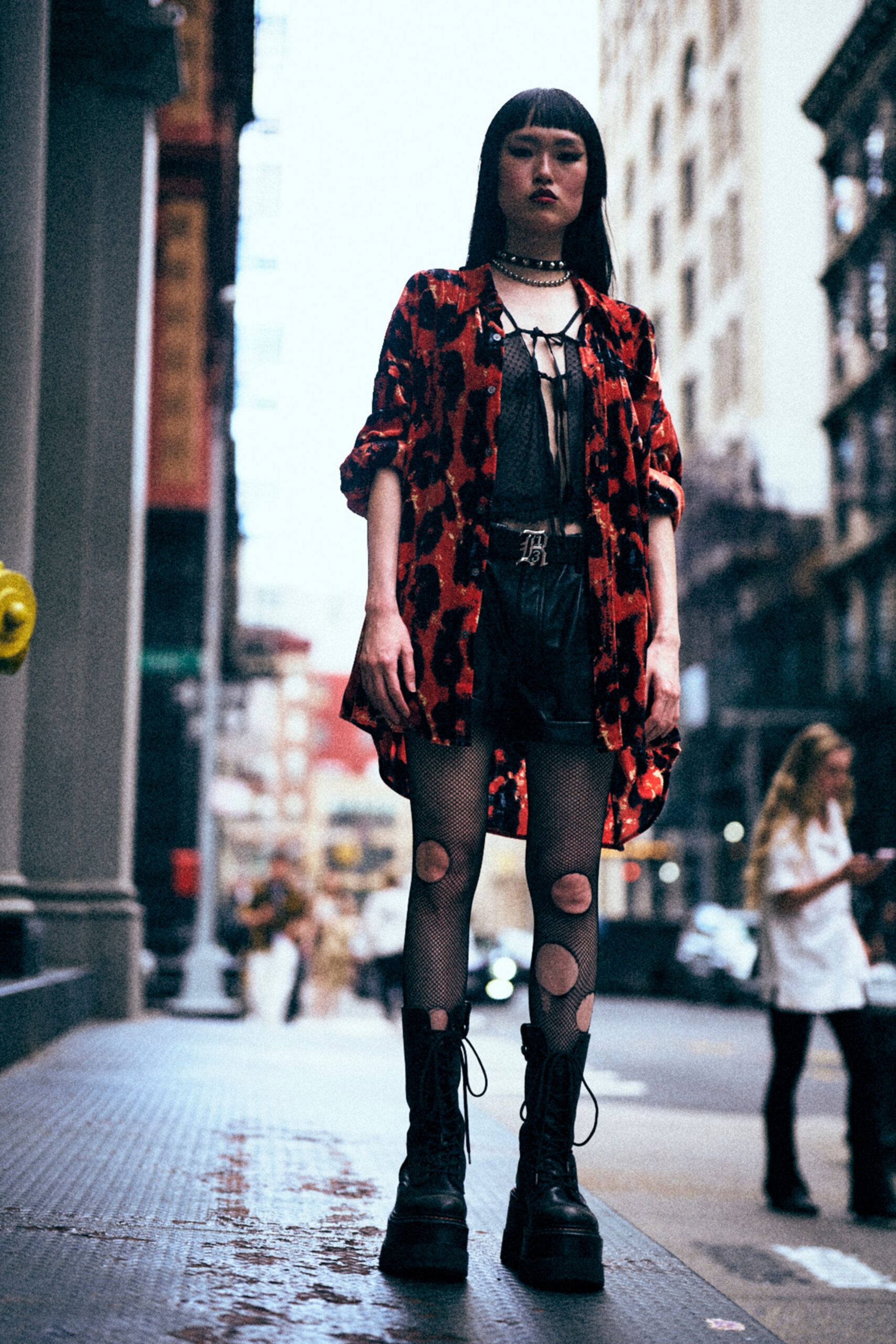 red black animal-print shirt with leather shorts
