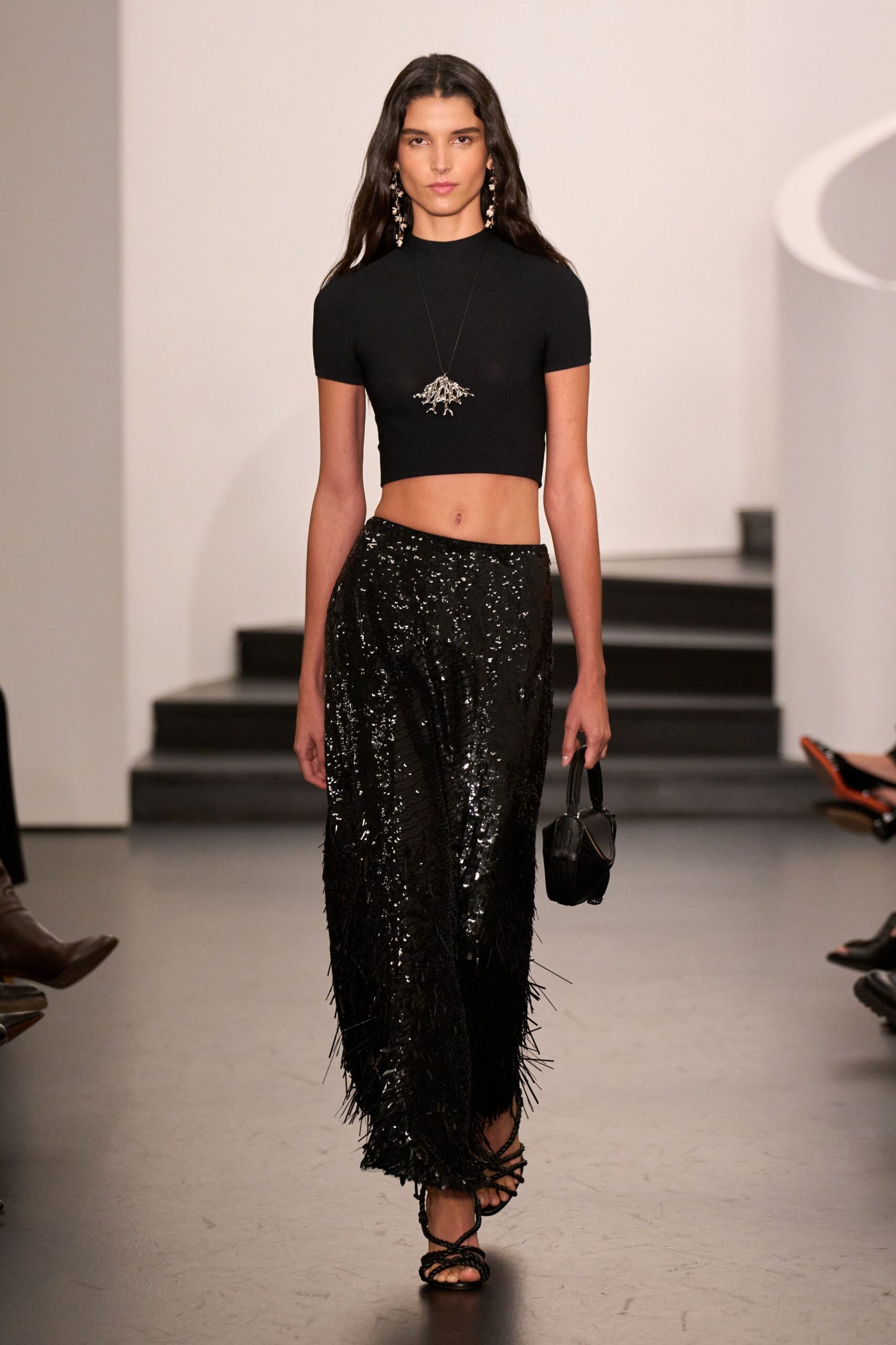 black crop-top and sequined skirt