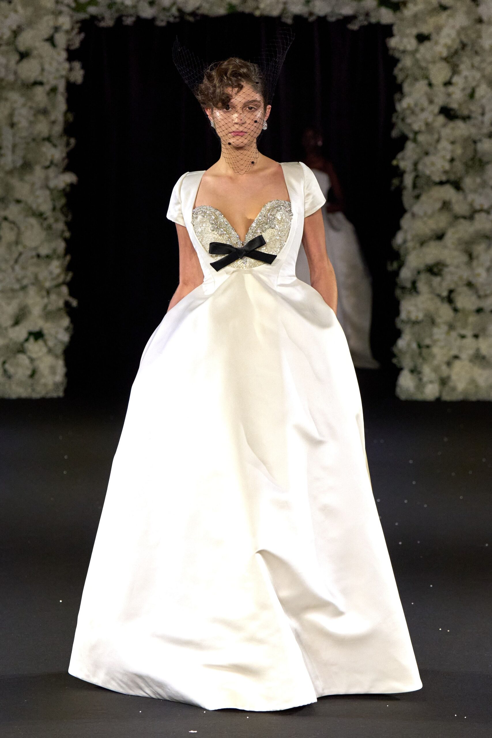 white silk embellished gown