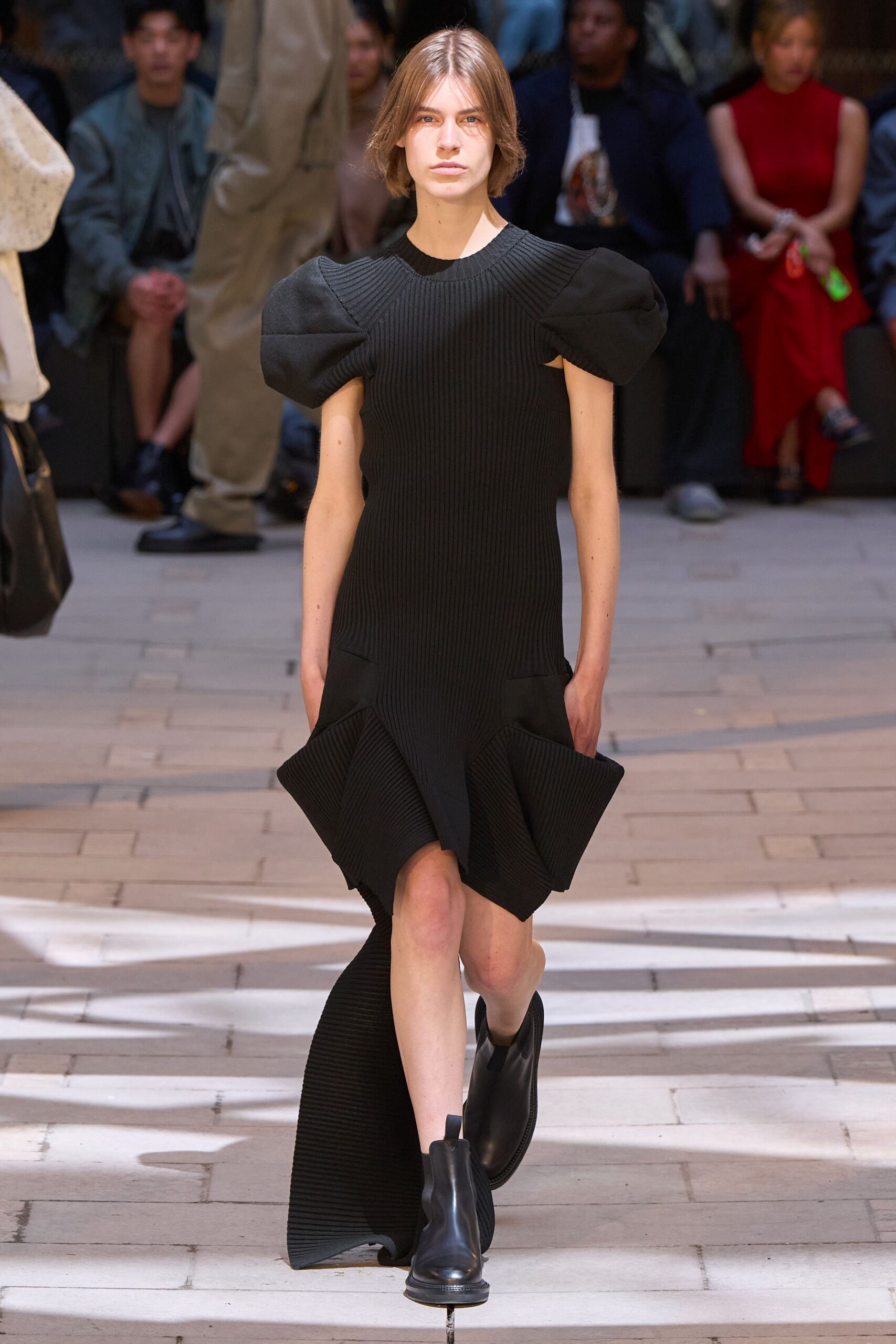 black fitted midi dress with pleats
