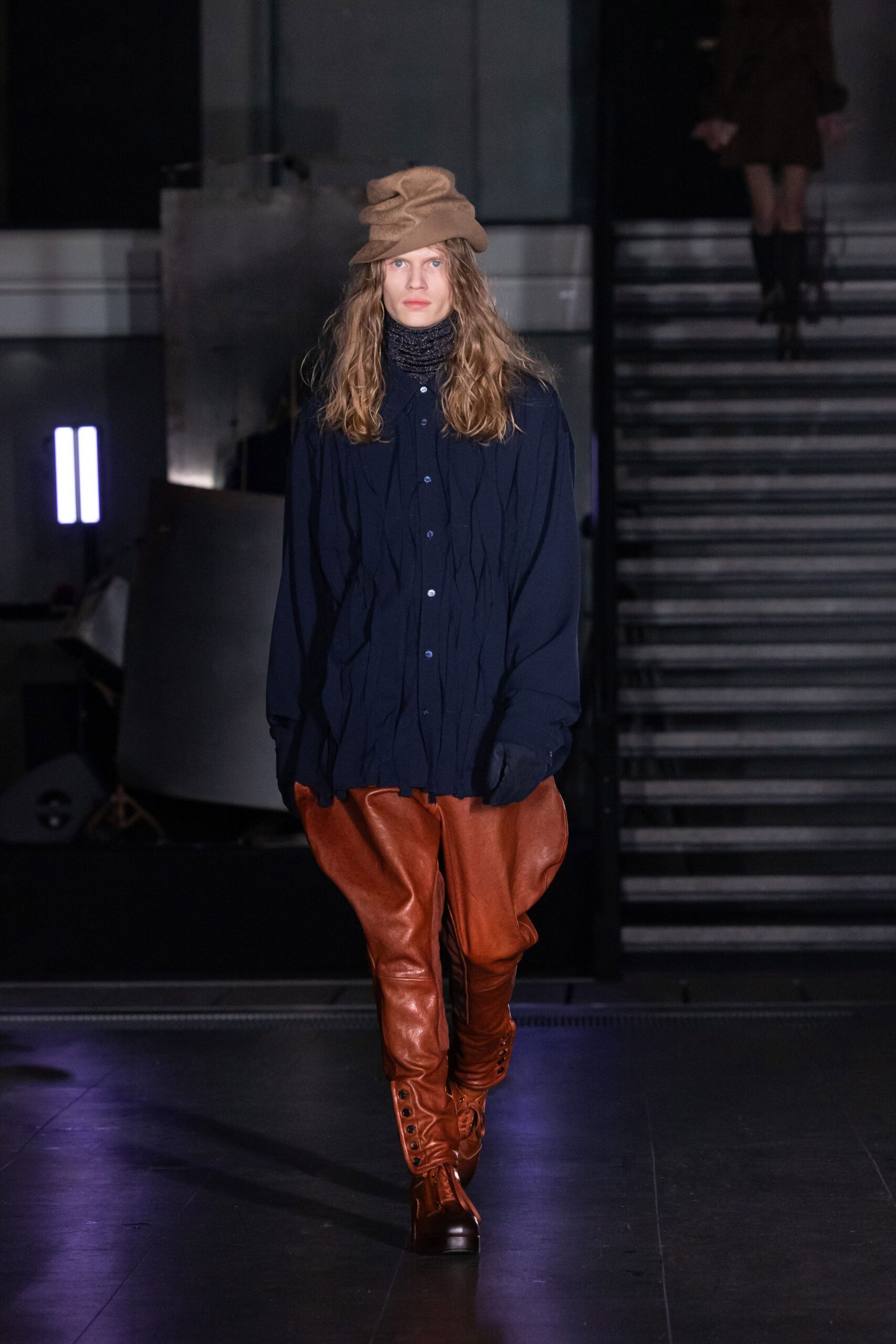 navy shirt brown leather pants