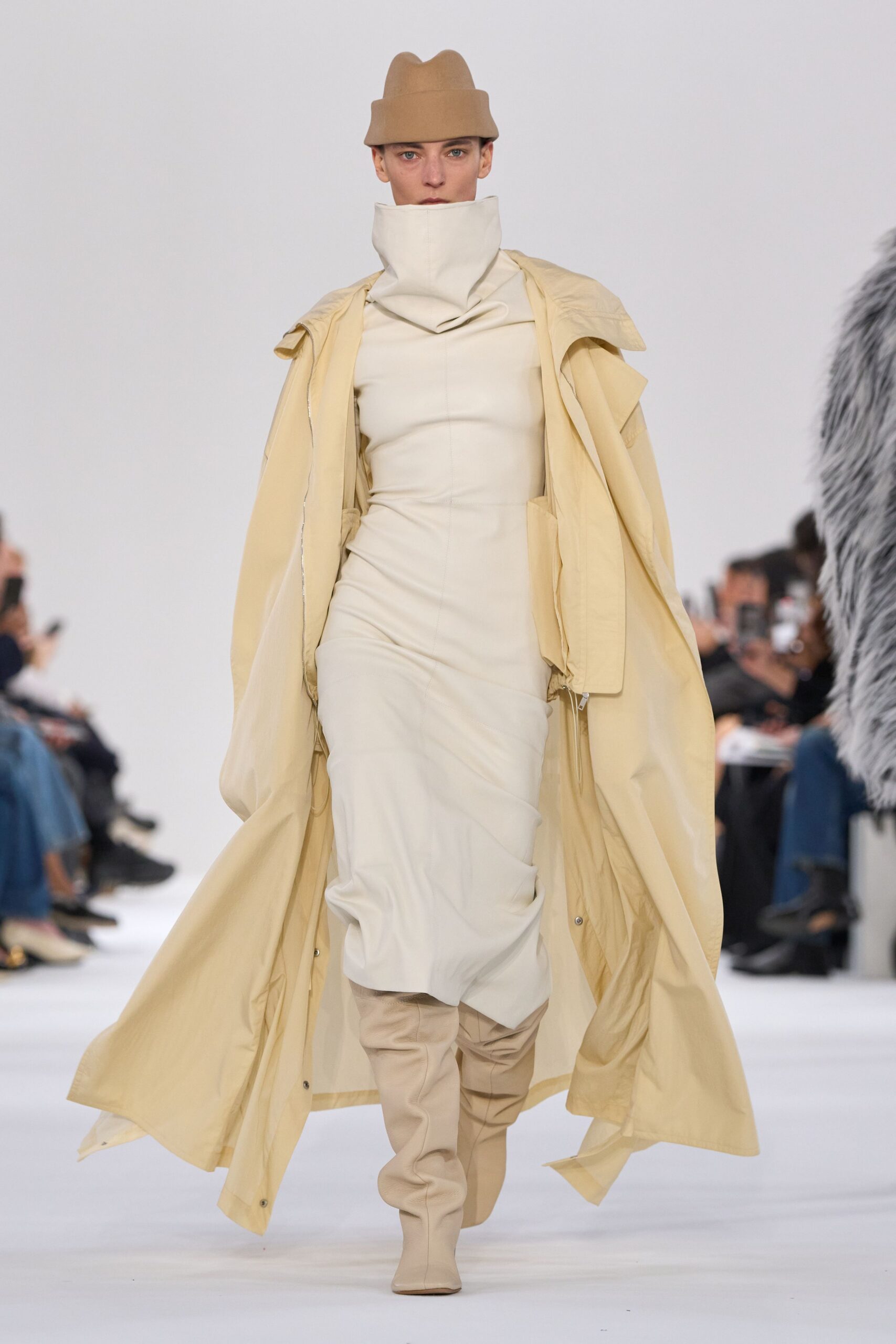 beige coat white dress beige boots hat