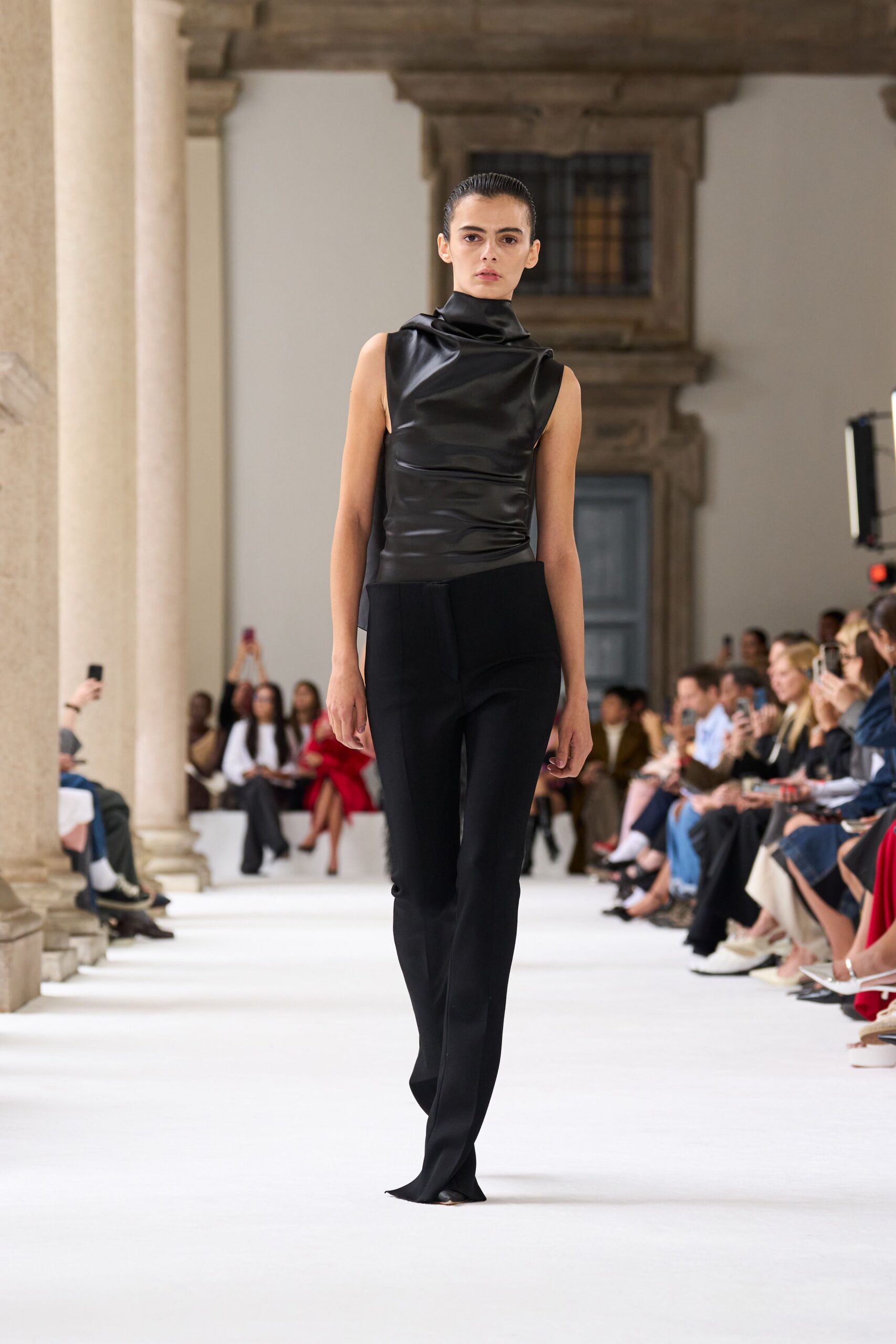 black leather sleeveless high-neck fitted draped top