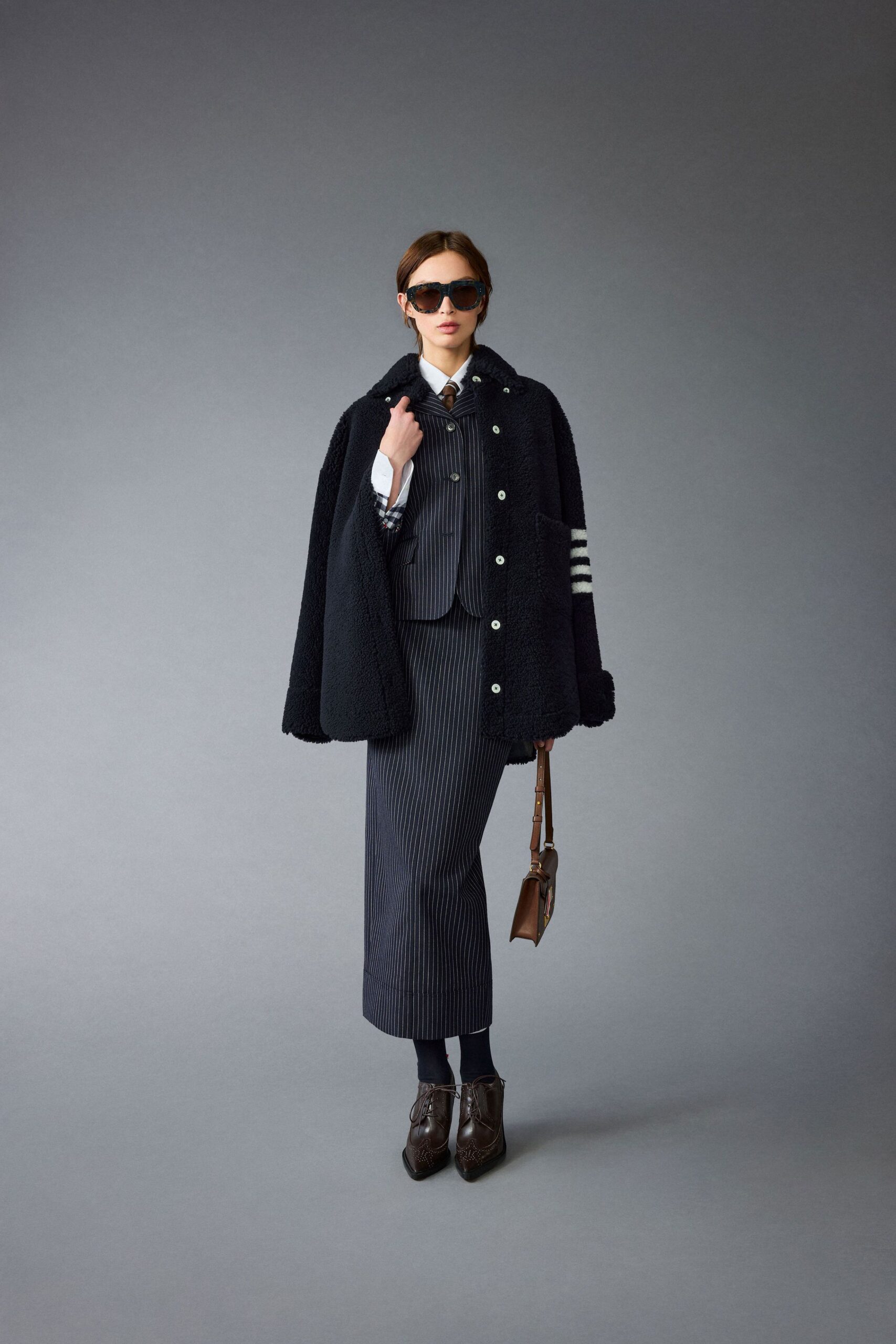 black faux-fur coat and tailored blazer
