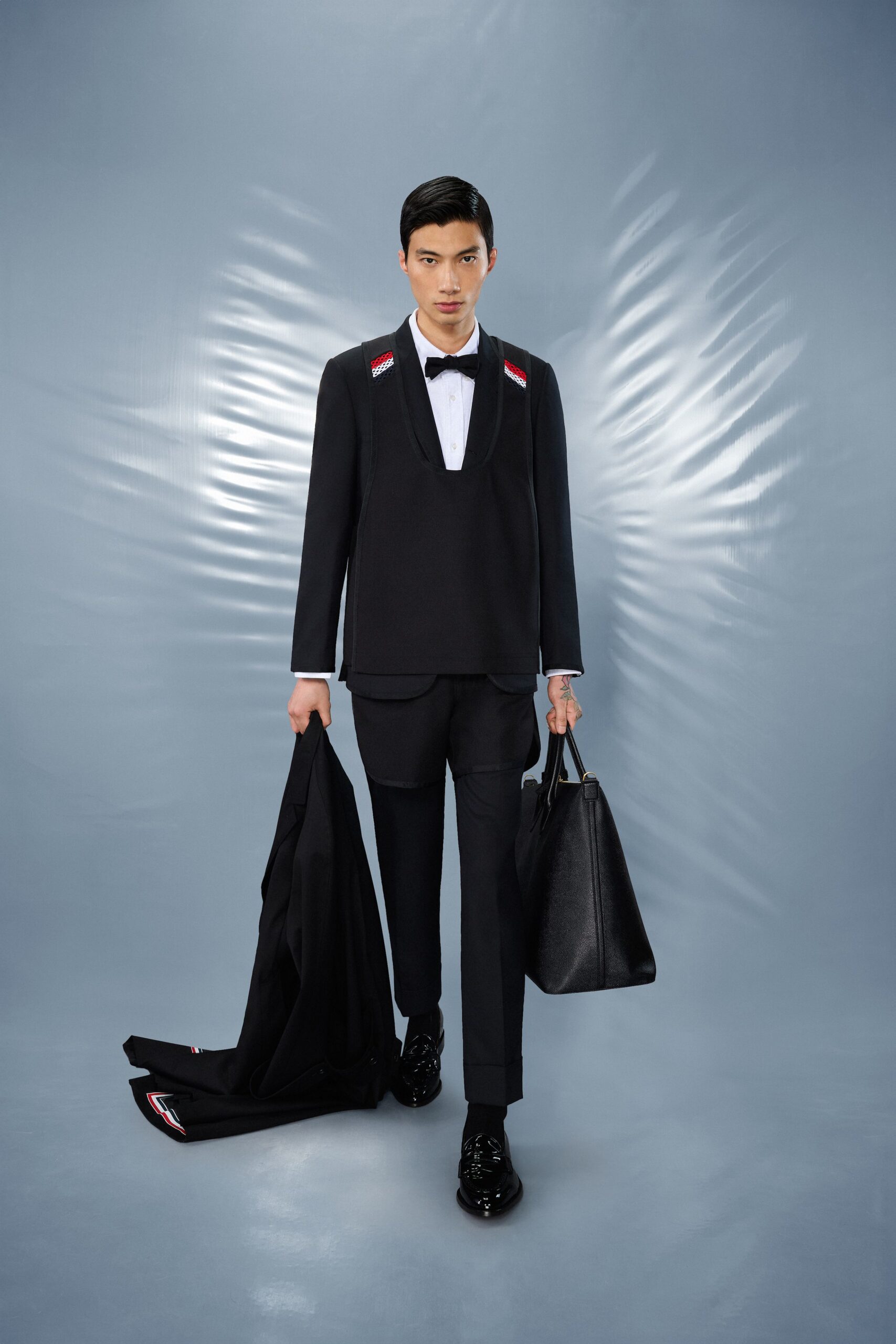 black tailored suit with white shirt