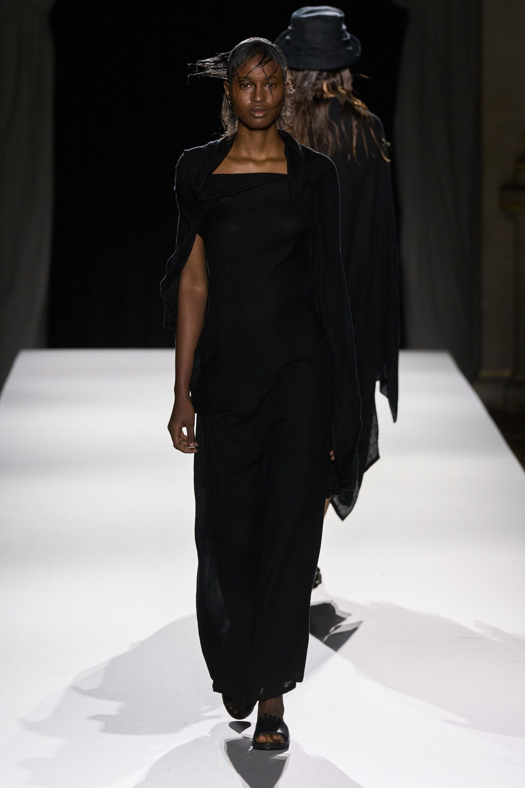 black fitted maxi dress with cape