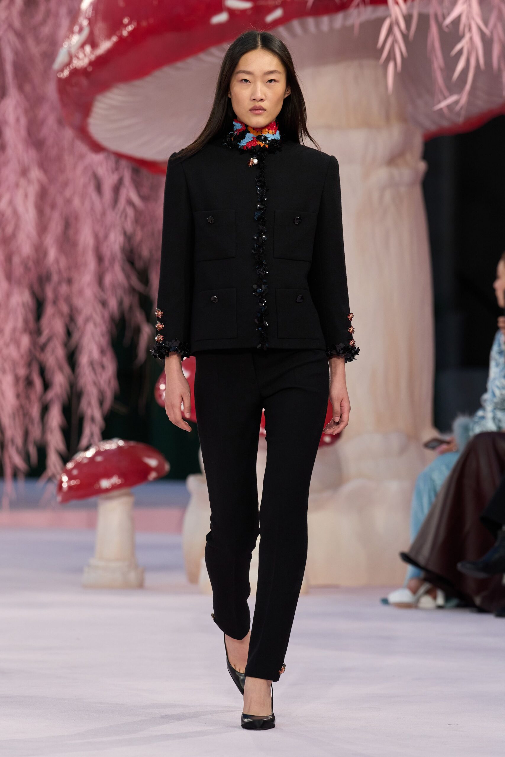 black fitted jacket with slim pants