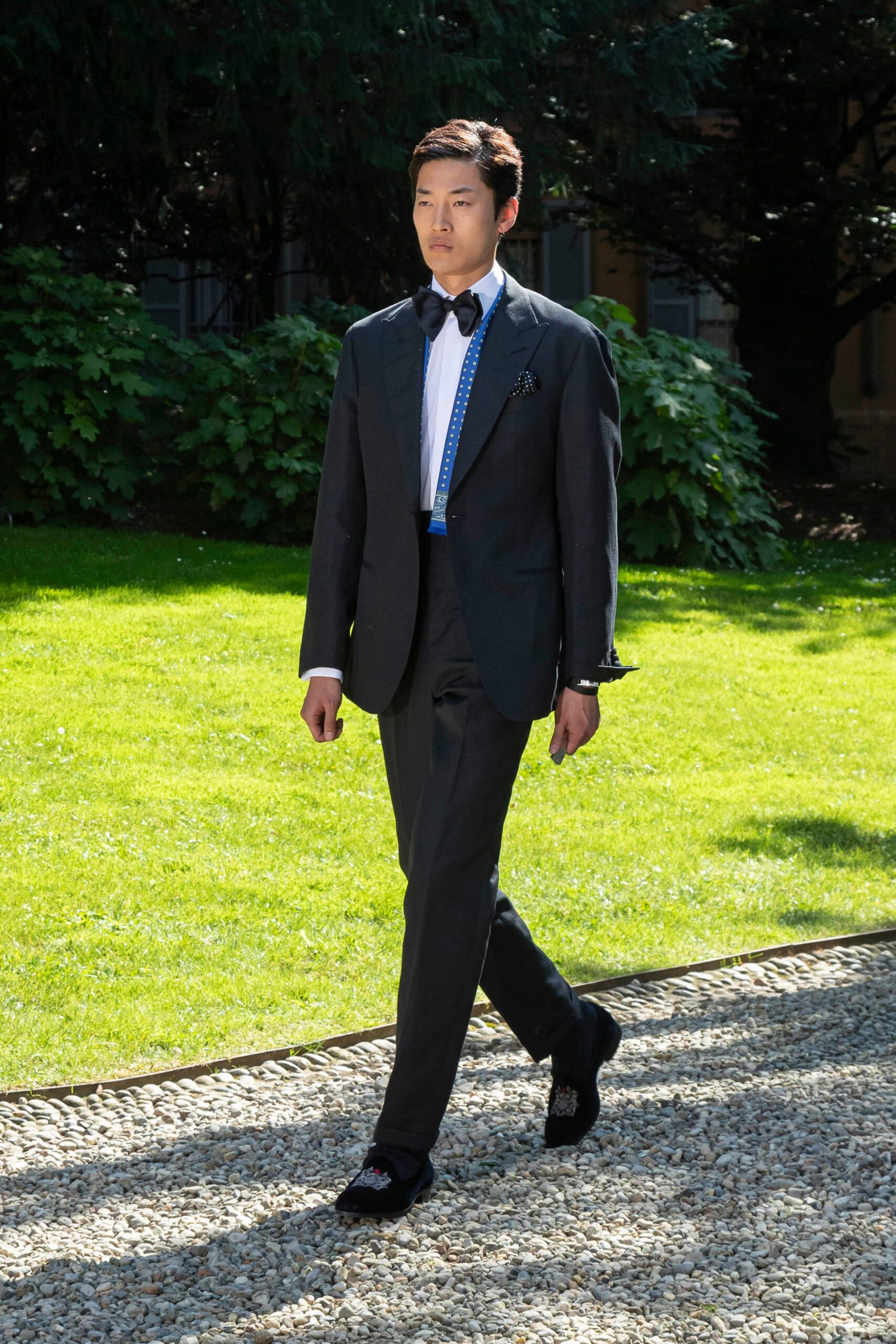 black tailored suit with white shirt