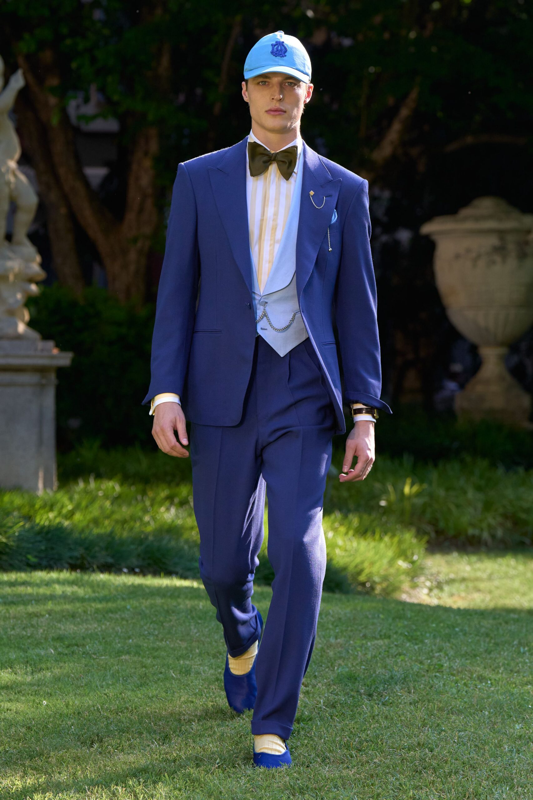 blue tailored suit with bowtie