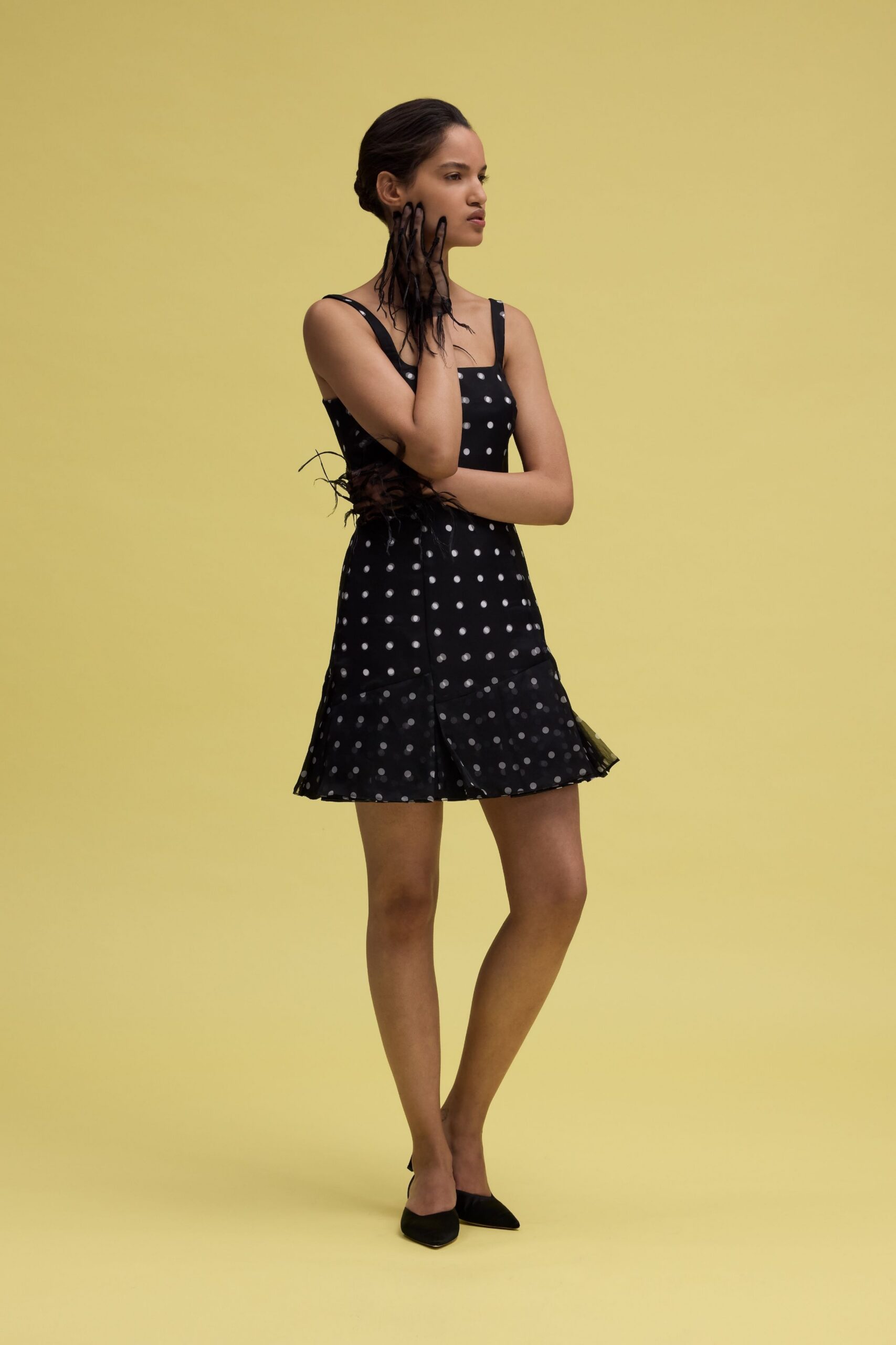 black polka-dot mini-dress with shoes