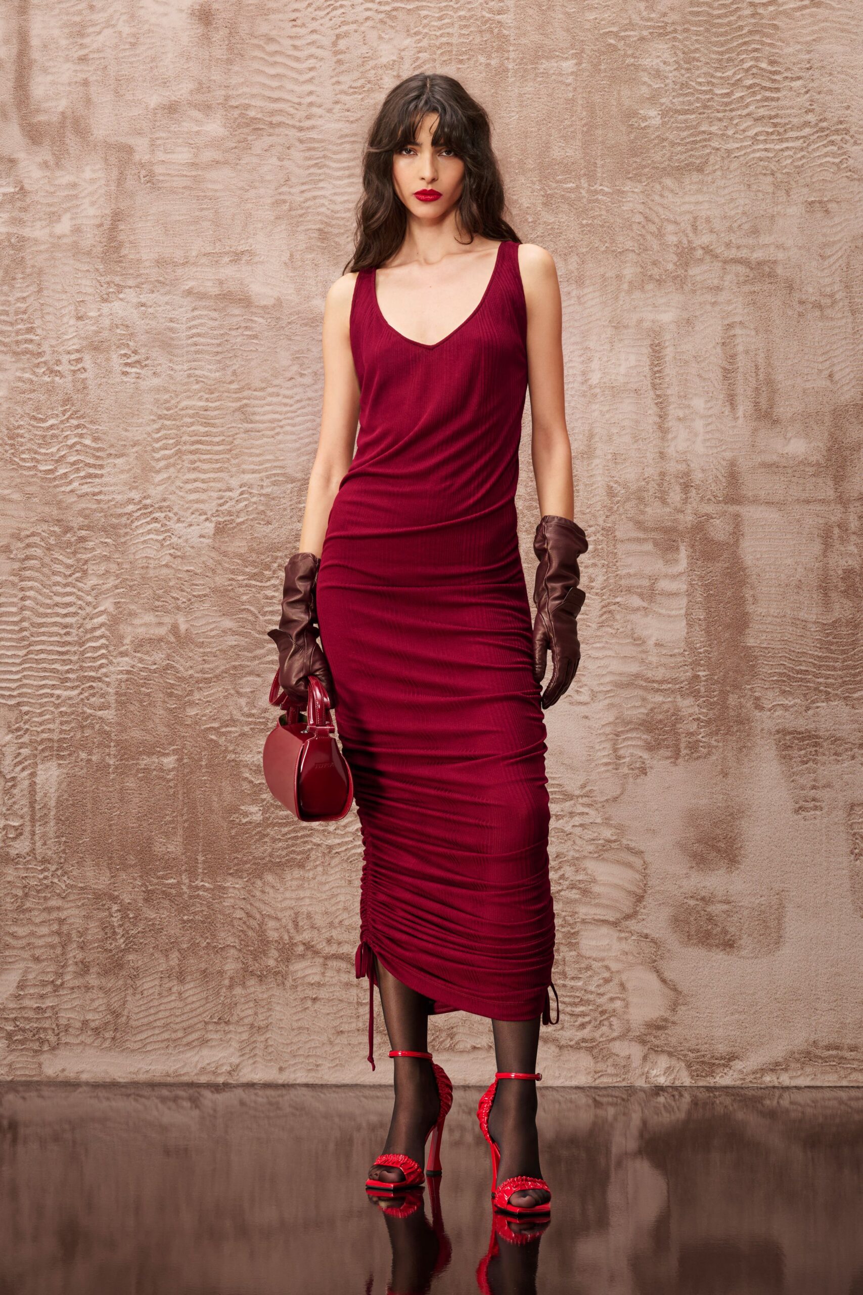 red silk sleeveless v-neck fitted ruched midi dress
