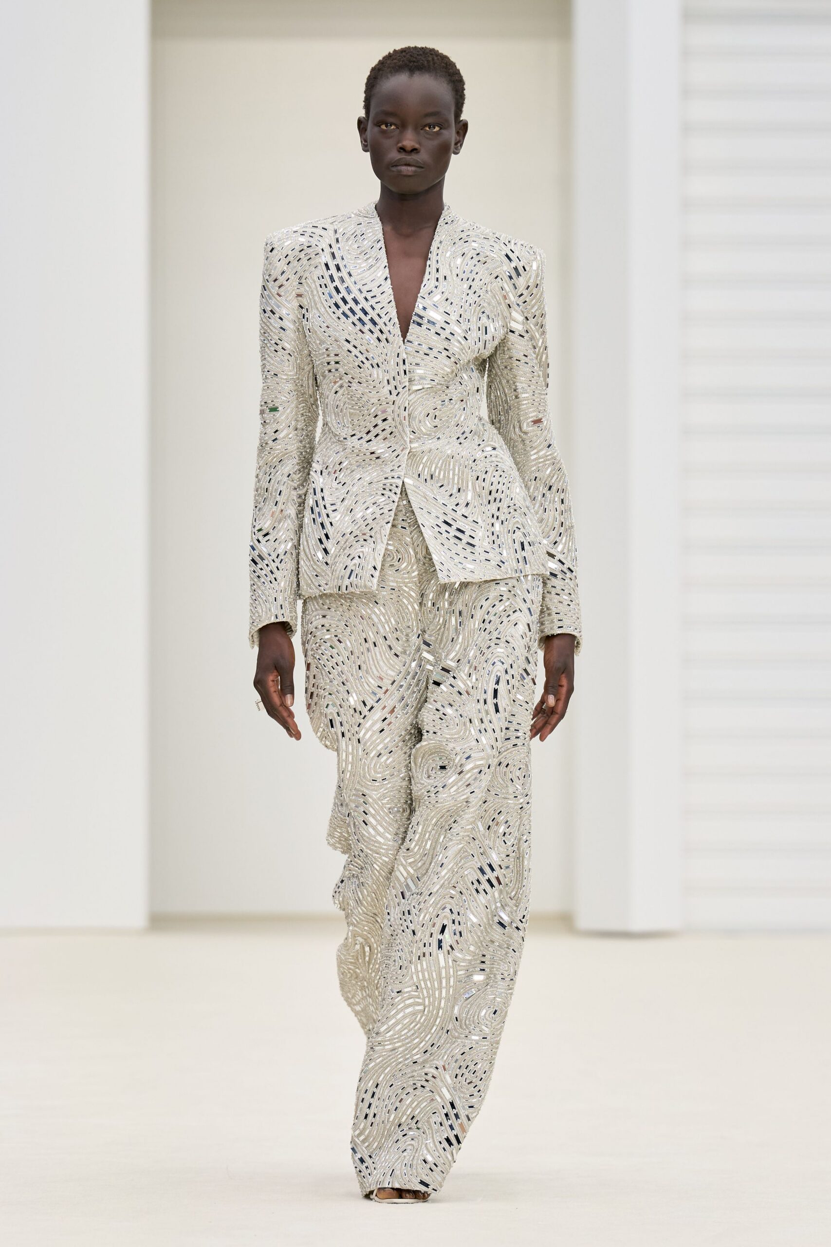white embroidered tailored suit