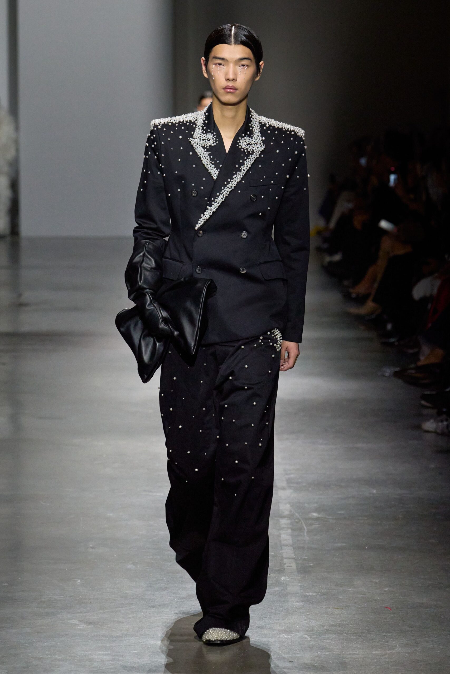 black tailored suit with bag