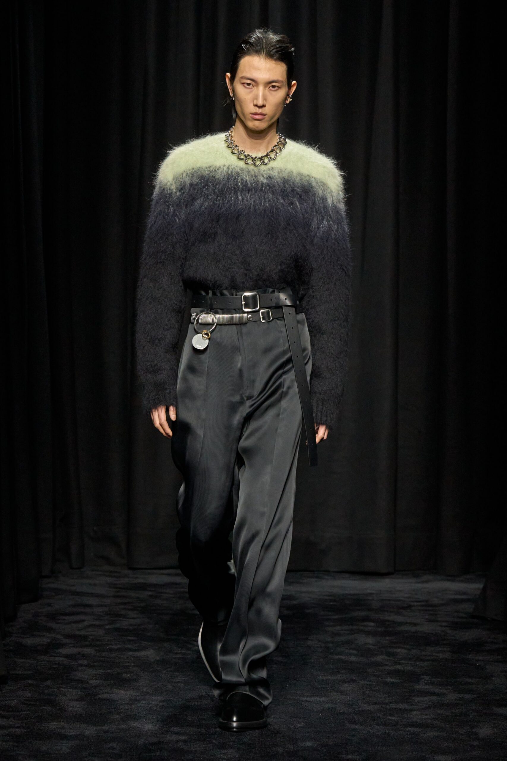 black and green wool sweater with relaxed pants