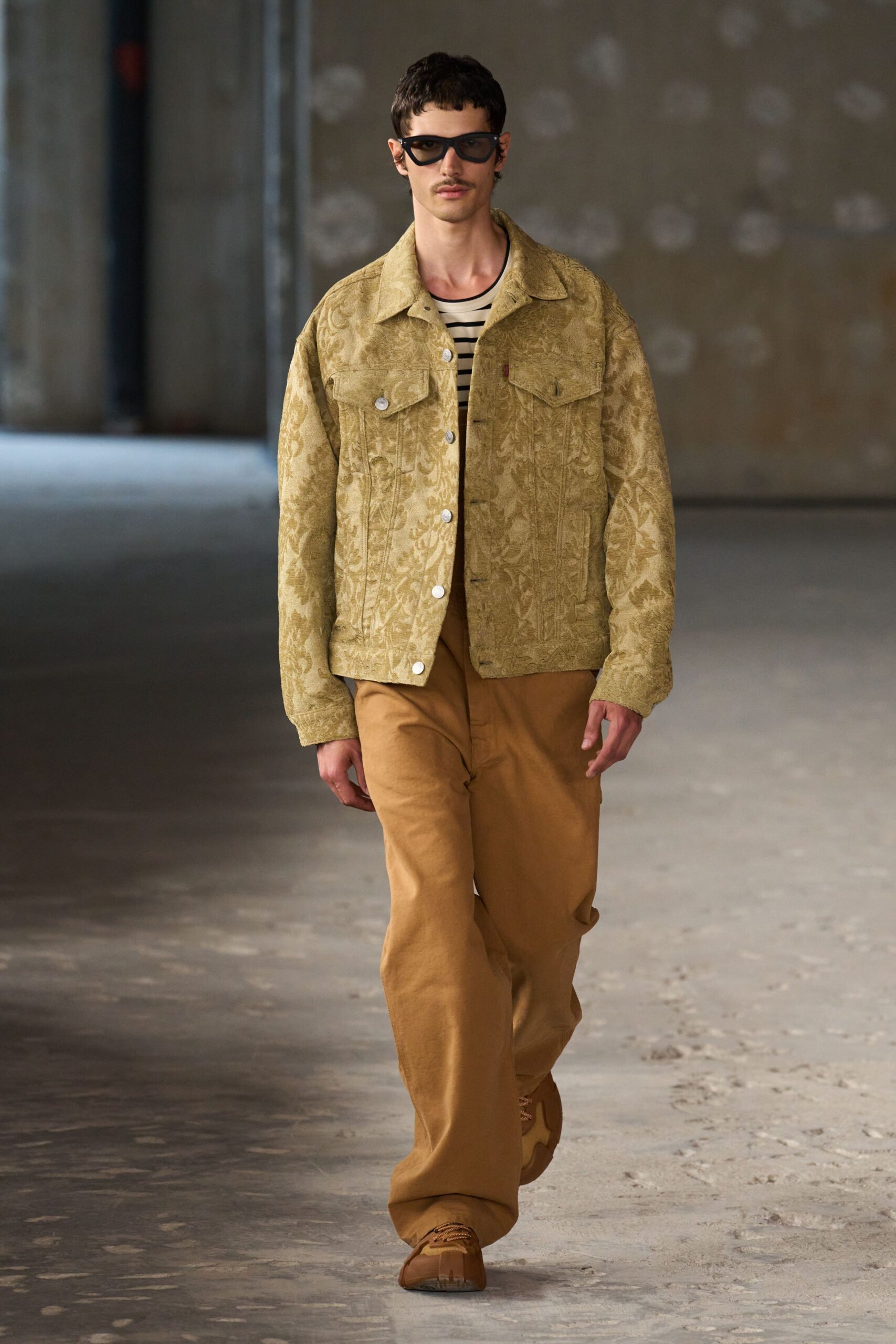 beige embroidered jacket with striped shirt