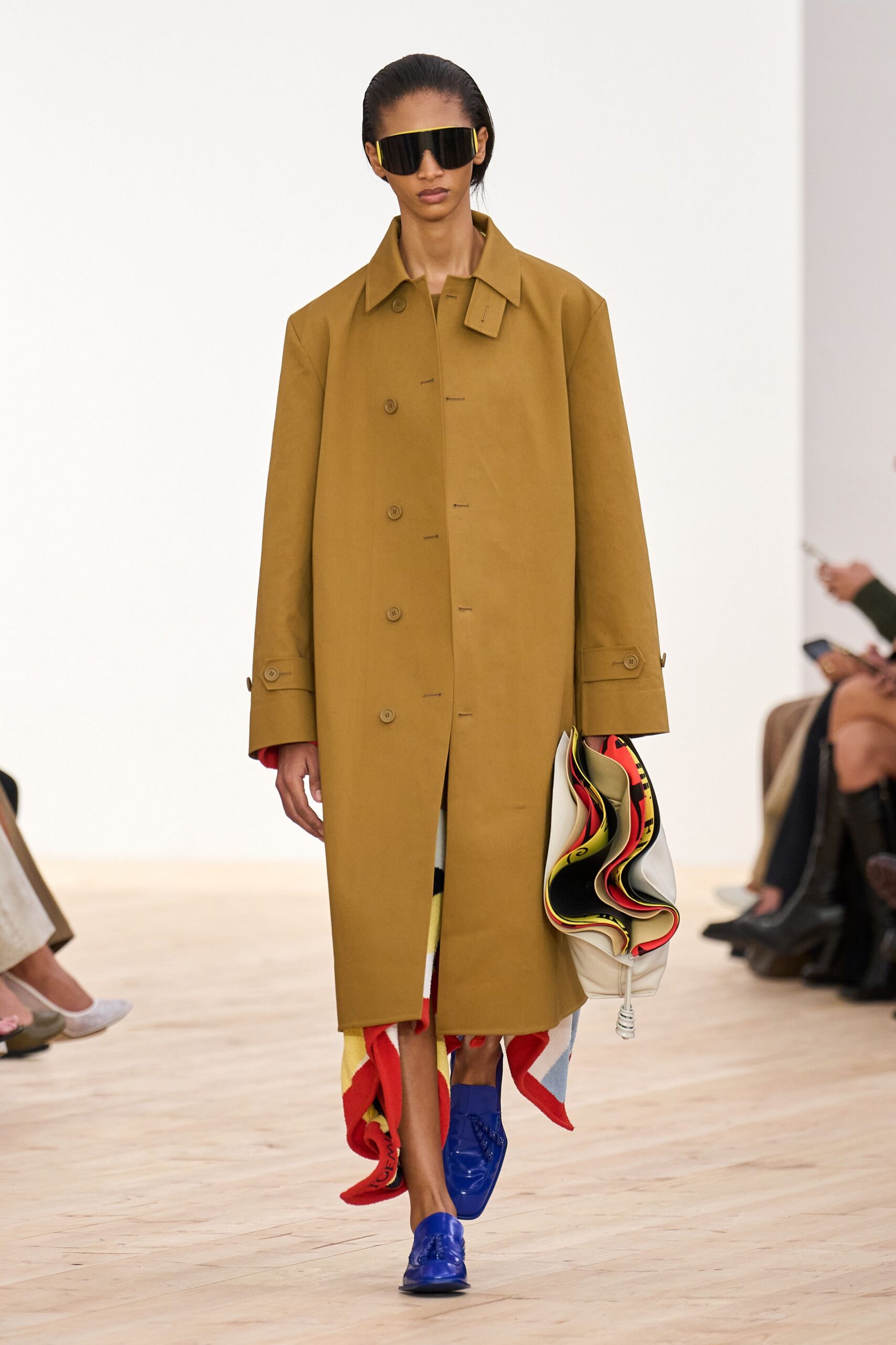 brown relaxed coat with blue shoes