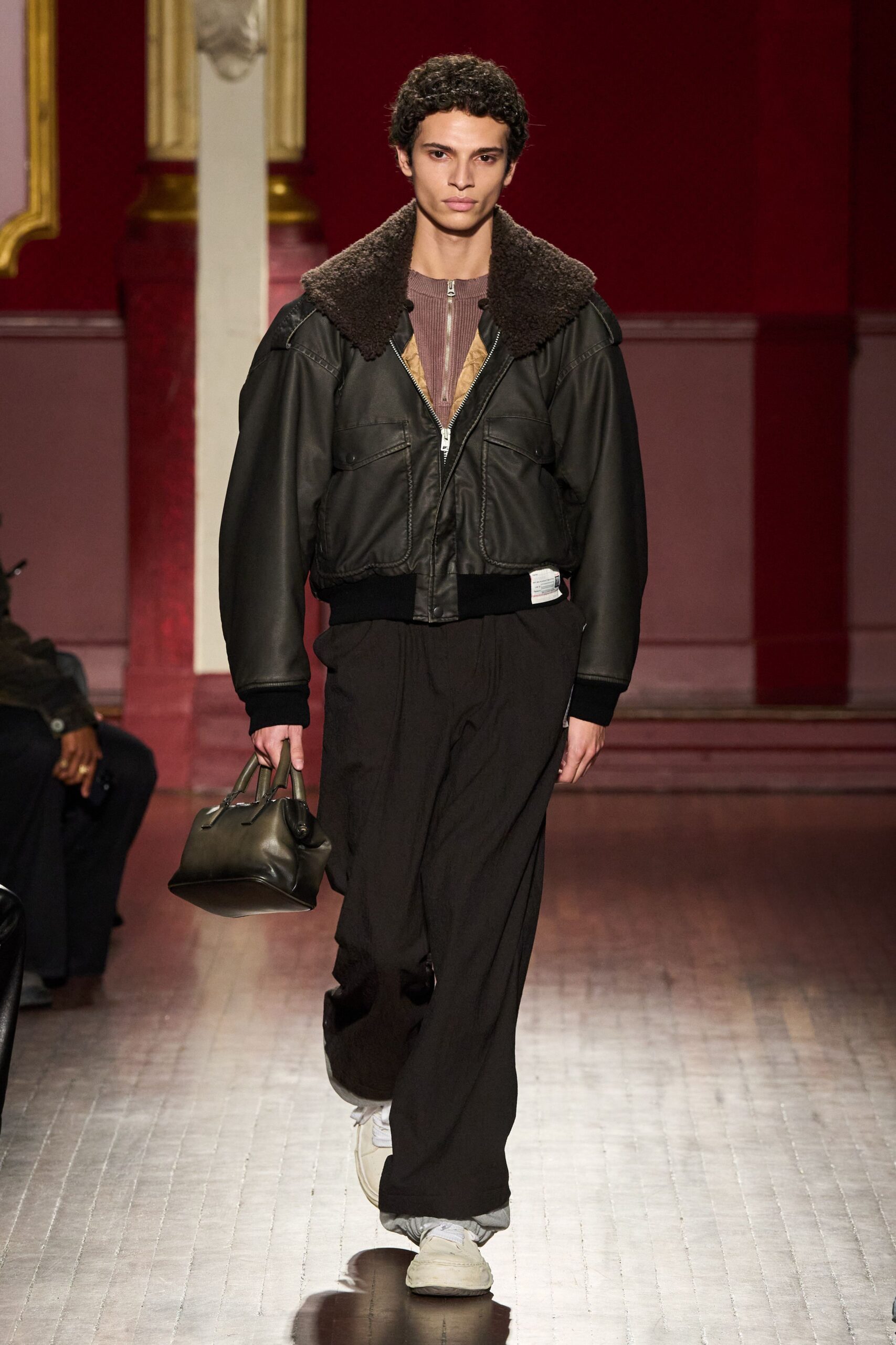 black leather jacket with brown shirt