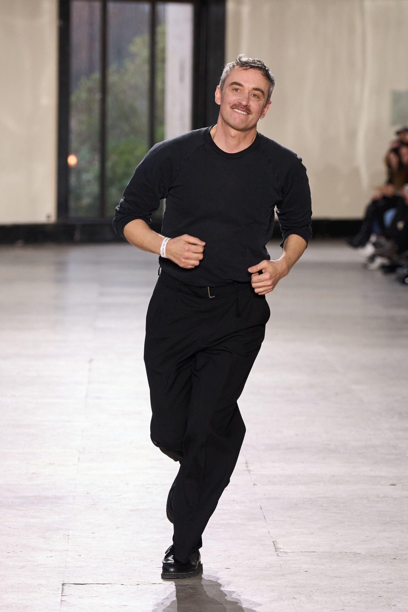 black fitted top and relaxed pants