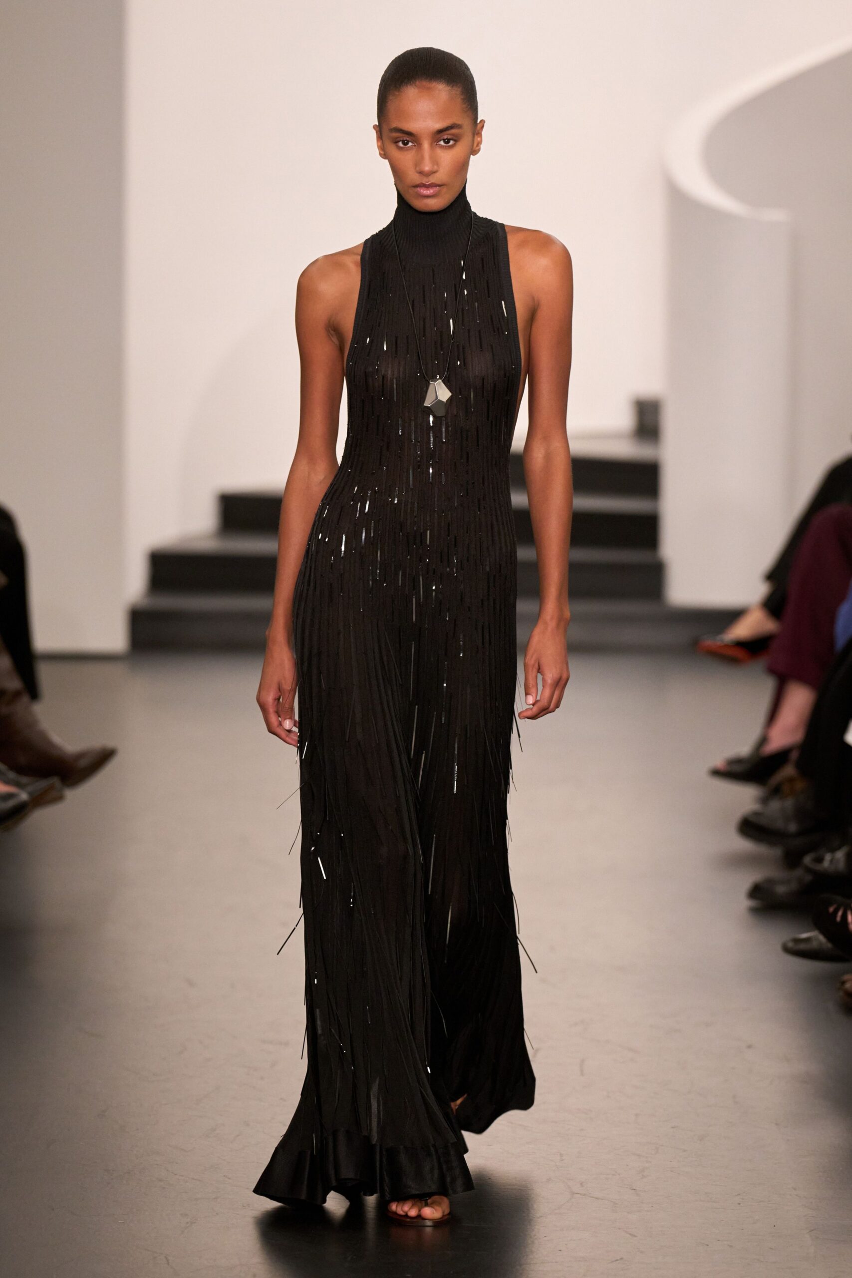 black fringed sleeveless jumpsuit