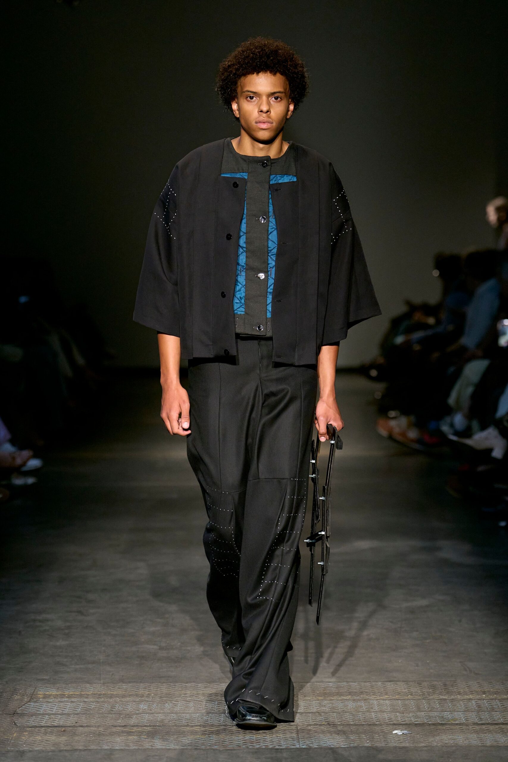 black relaxed jacket with blue shirt