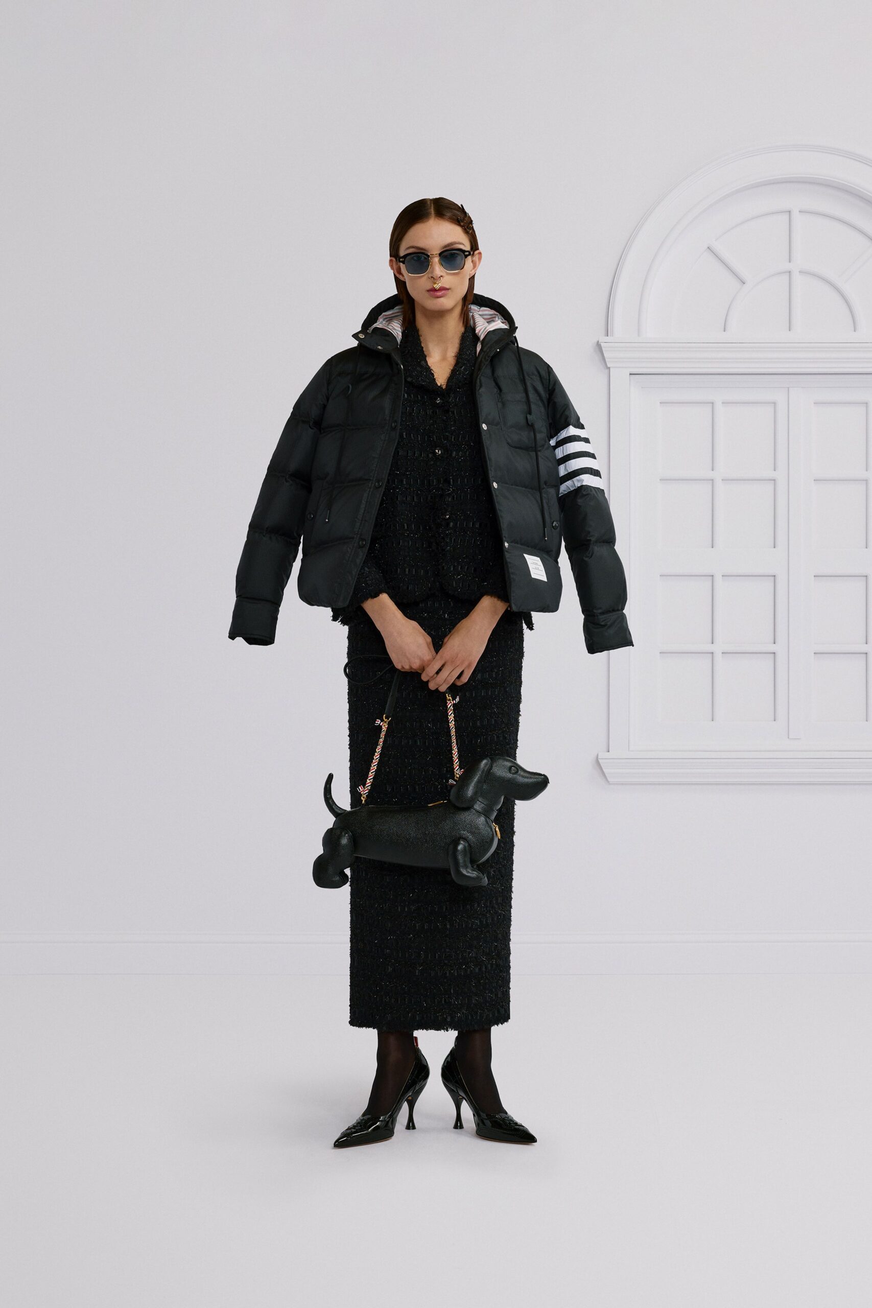 black puffer jacket and dress