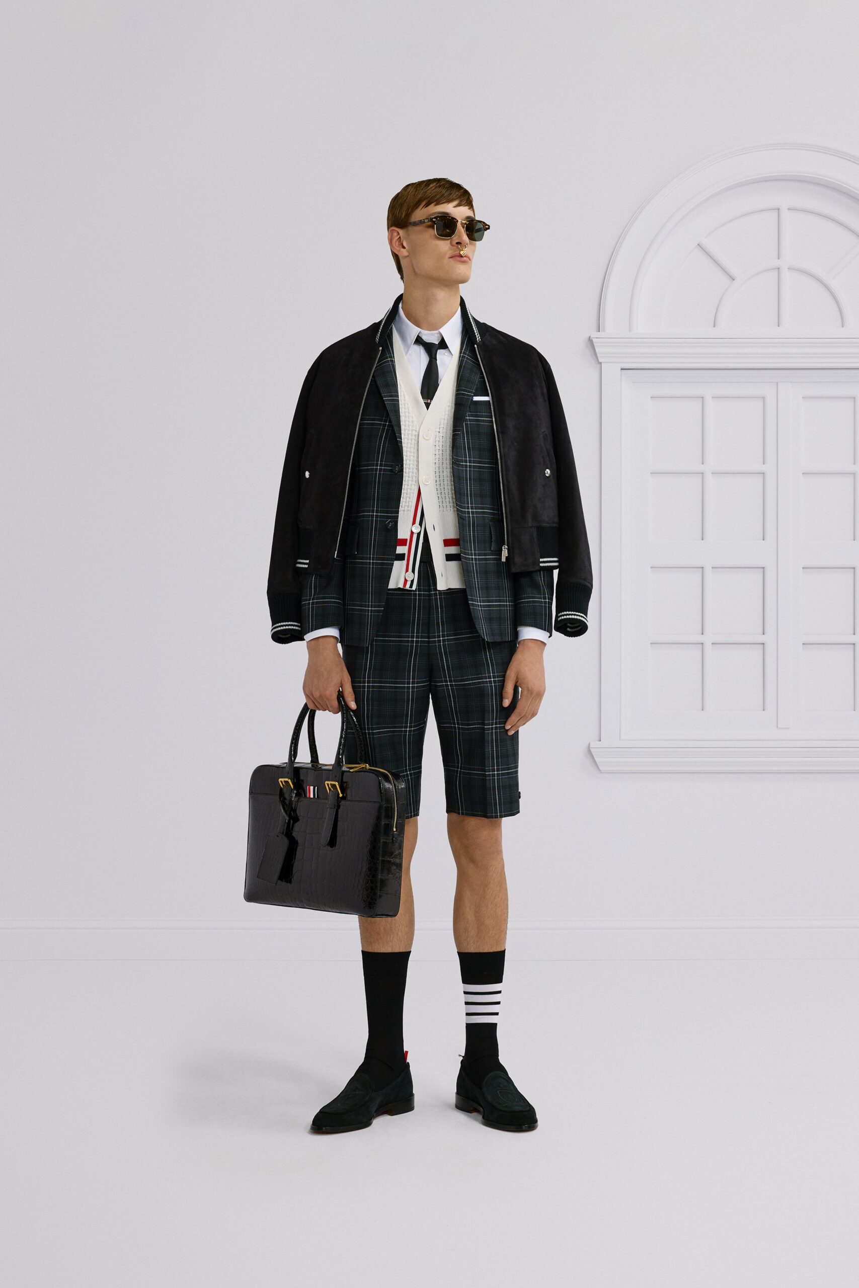 black suede jacket with plaid shorts