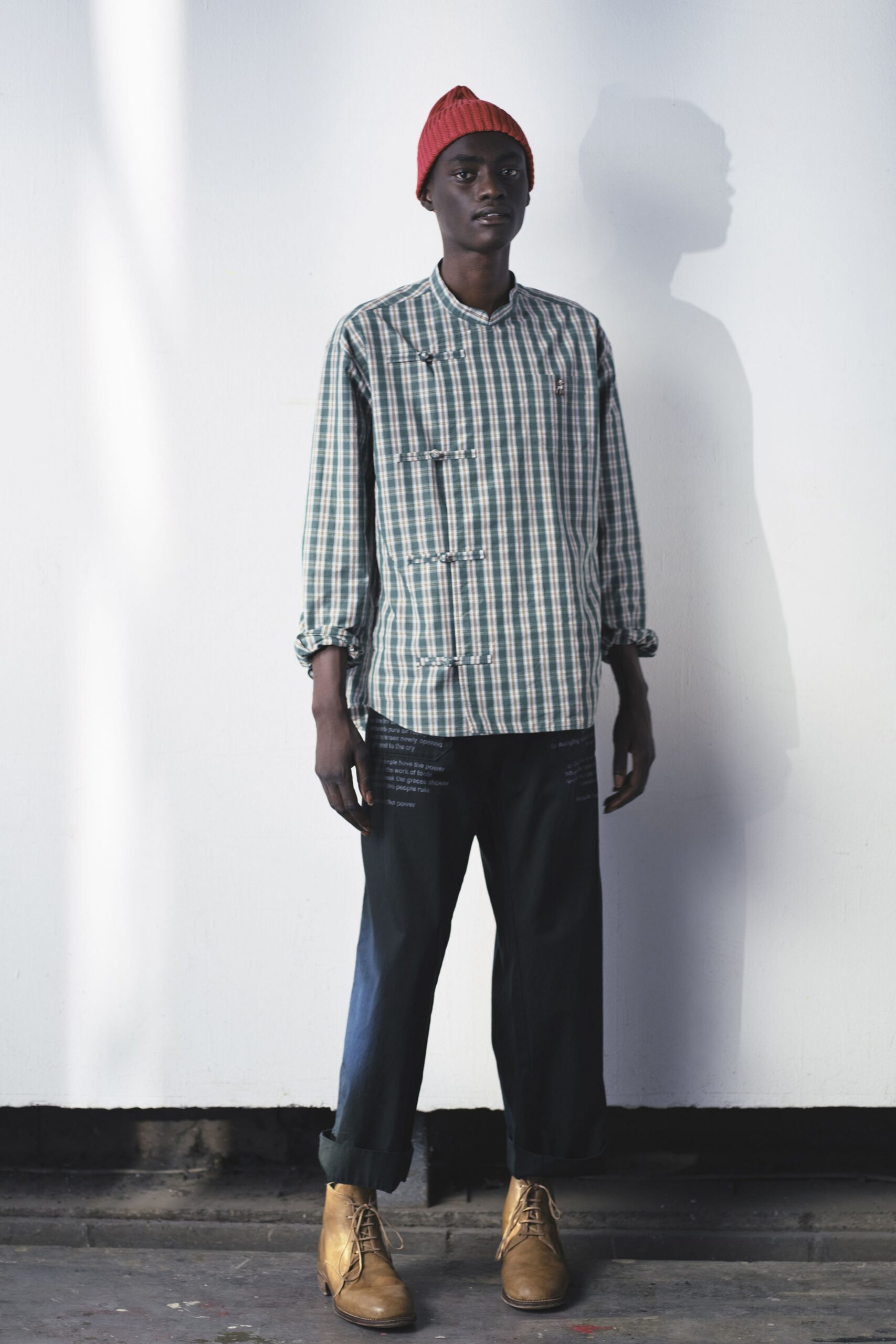 green checked shirt with blue pants