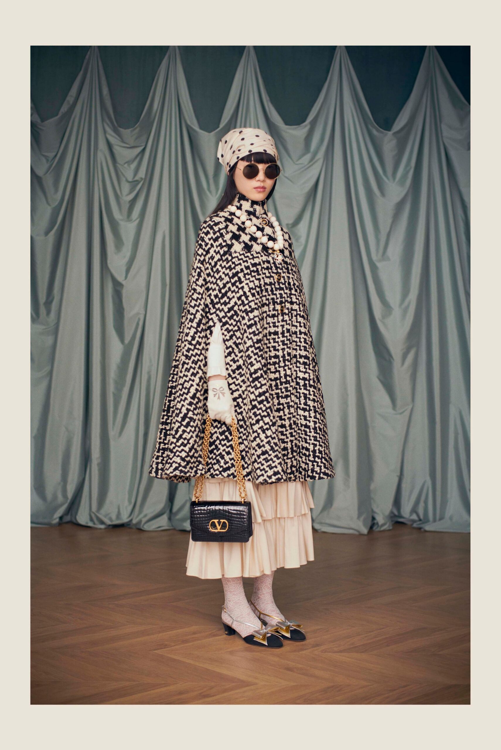 black and white checked cape