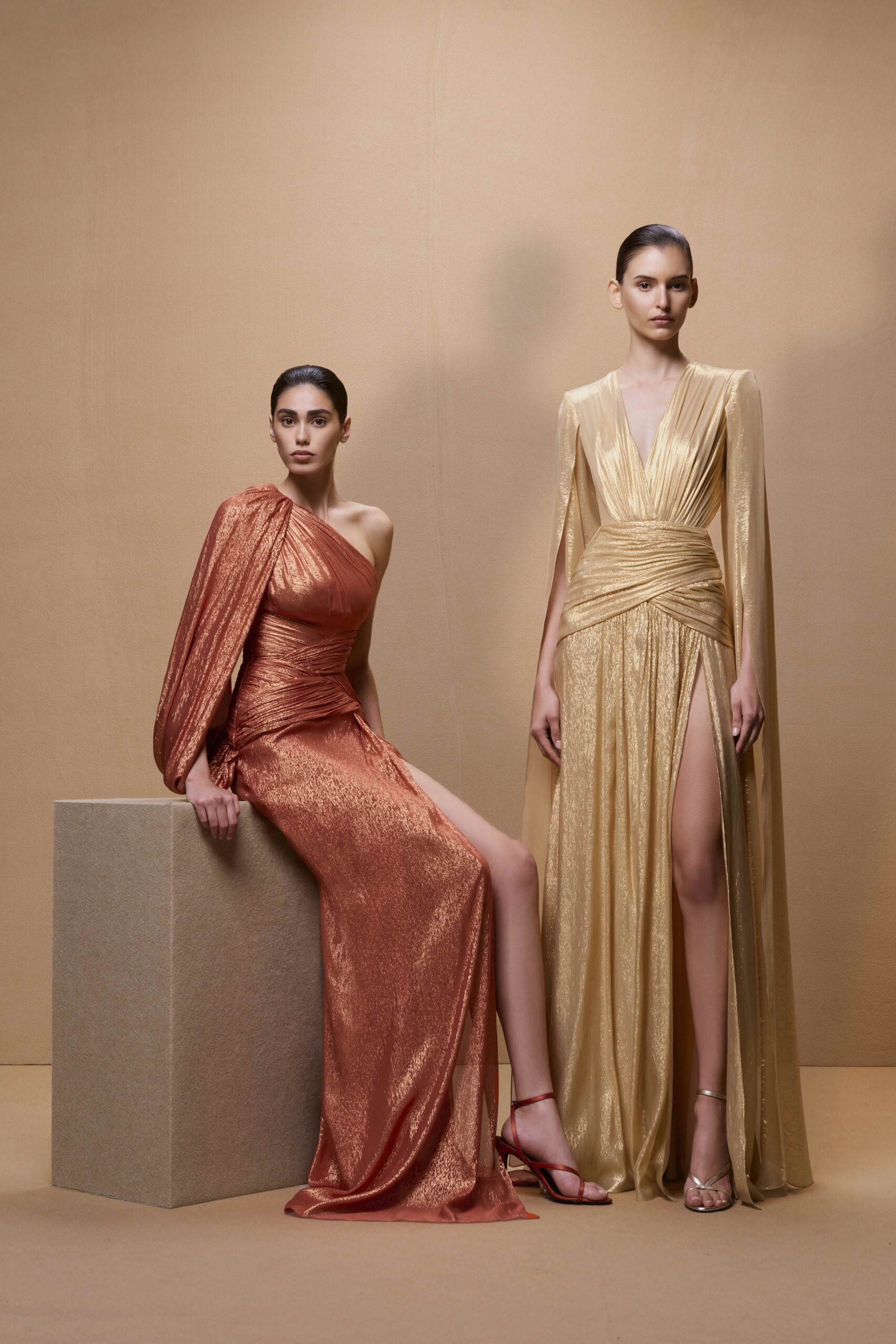 orange silk long-sleeve v-neck fitted draped shiny gown
