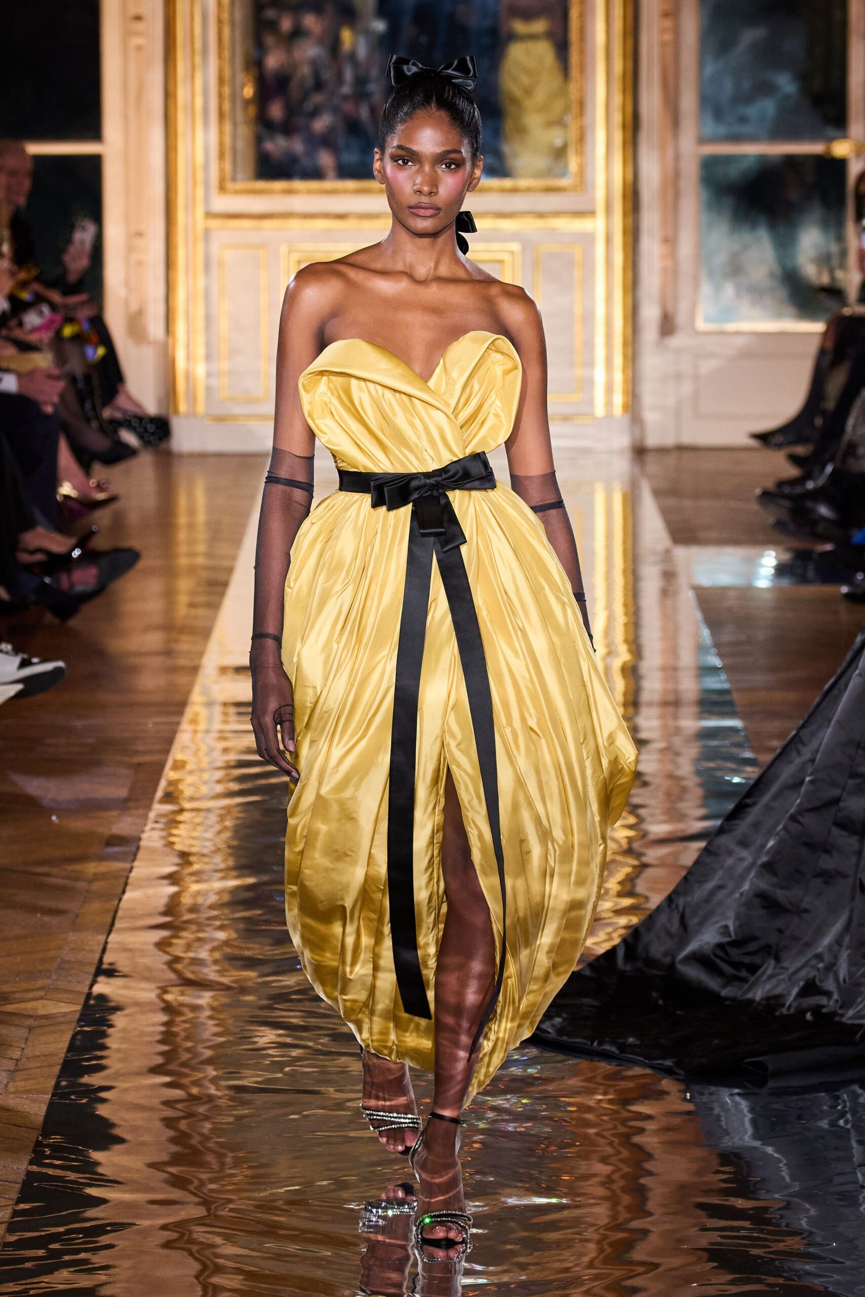yellow silk strapless high-neck fitted draped flowing gown