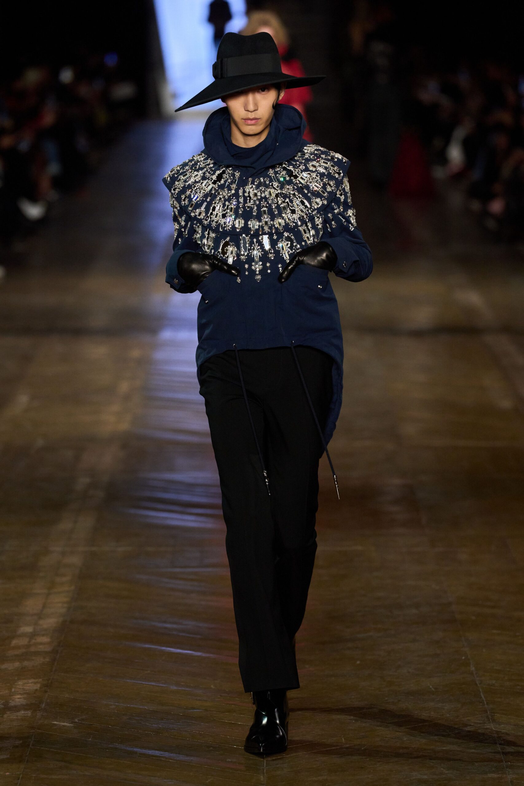 blue embroidered jacket with black pants