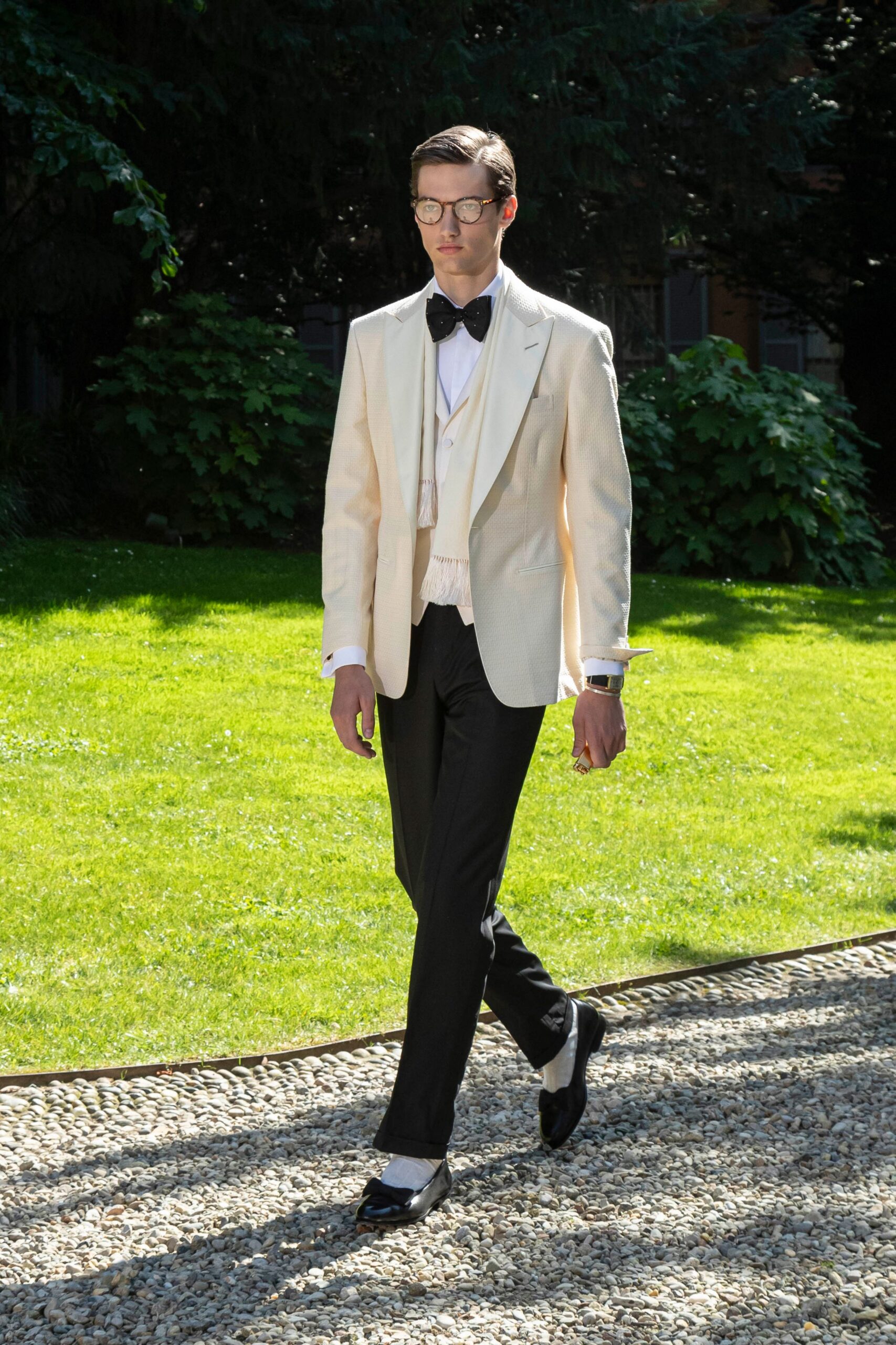white tailored suit with black pants