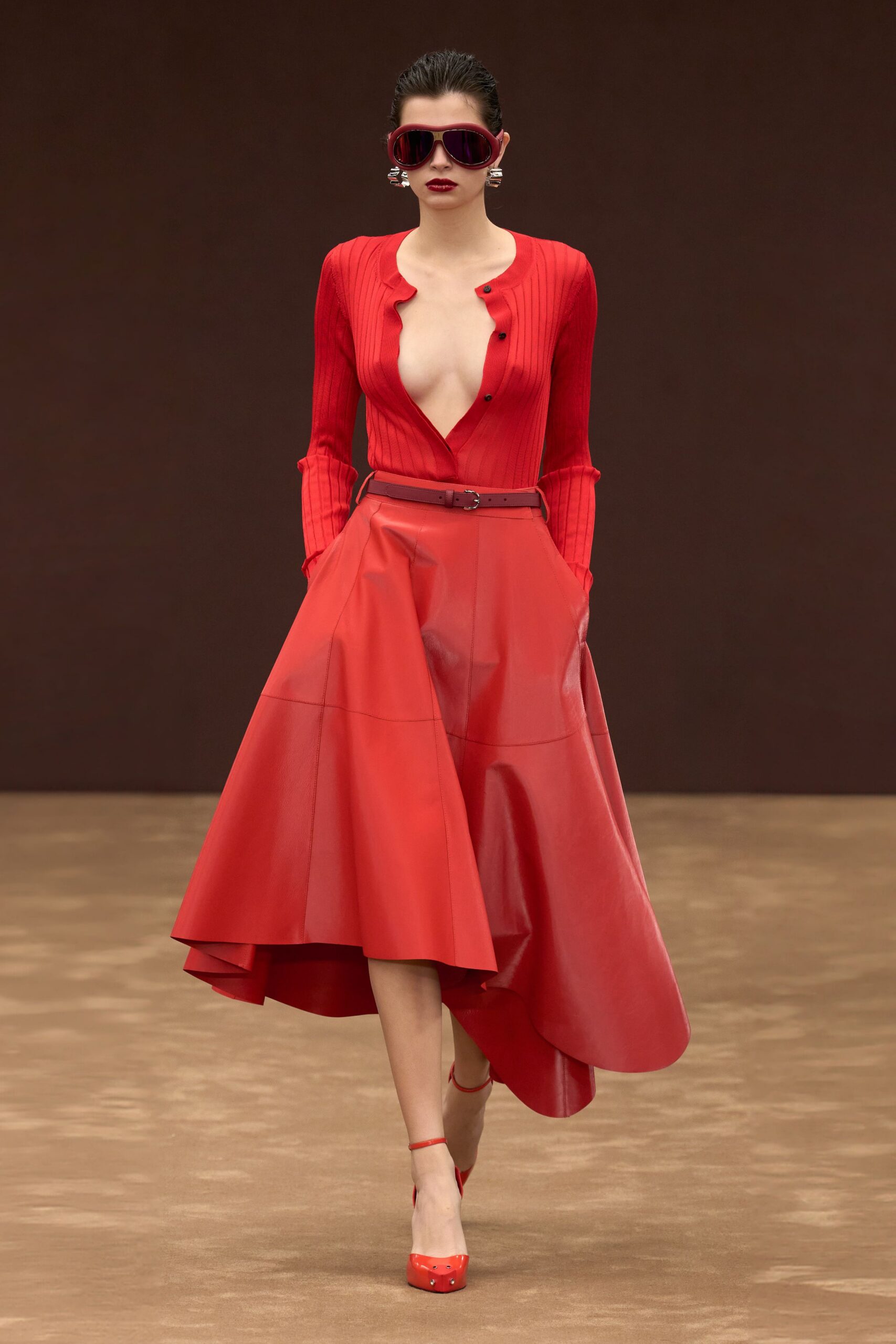 red leather long-sleeve v-neck fitted pleated belted dress