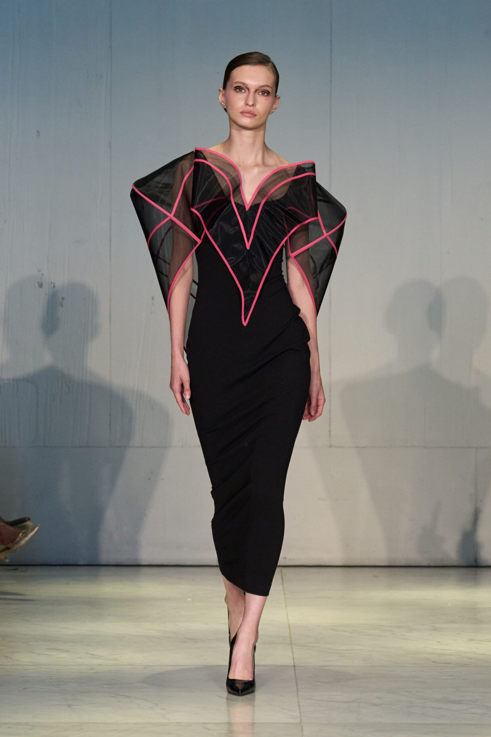 black fitted midi dress with sheer details