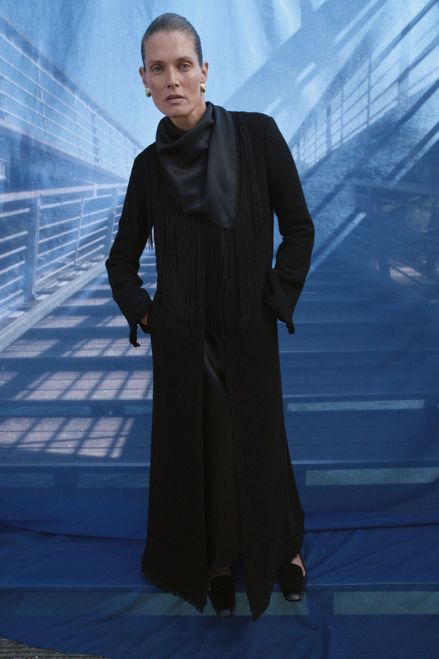 black wool coat with fringes