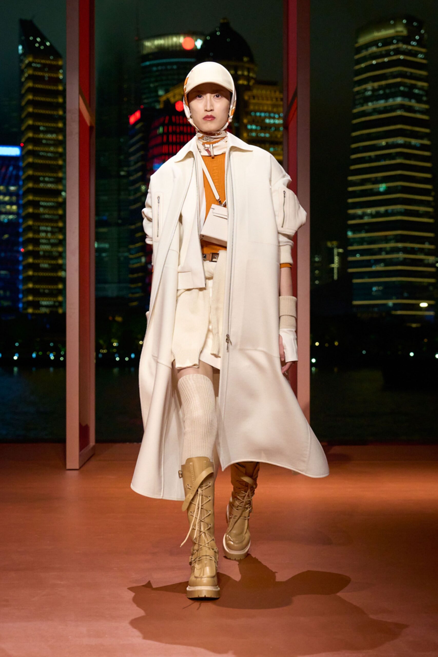white coat with orange top