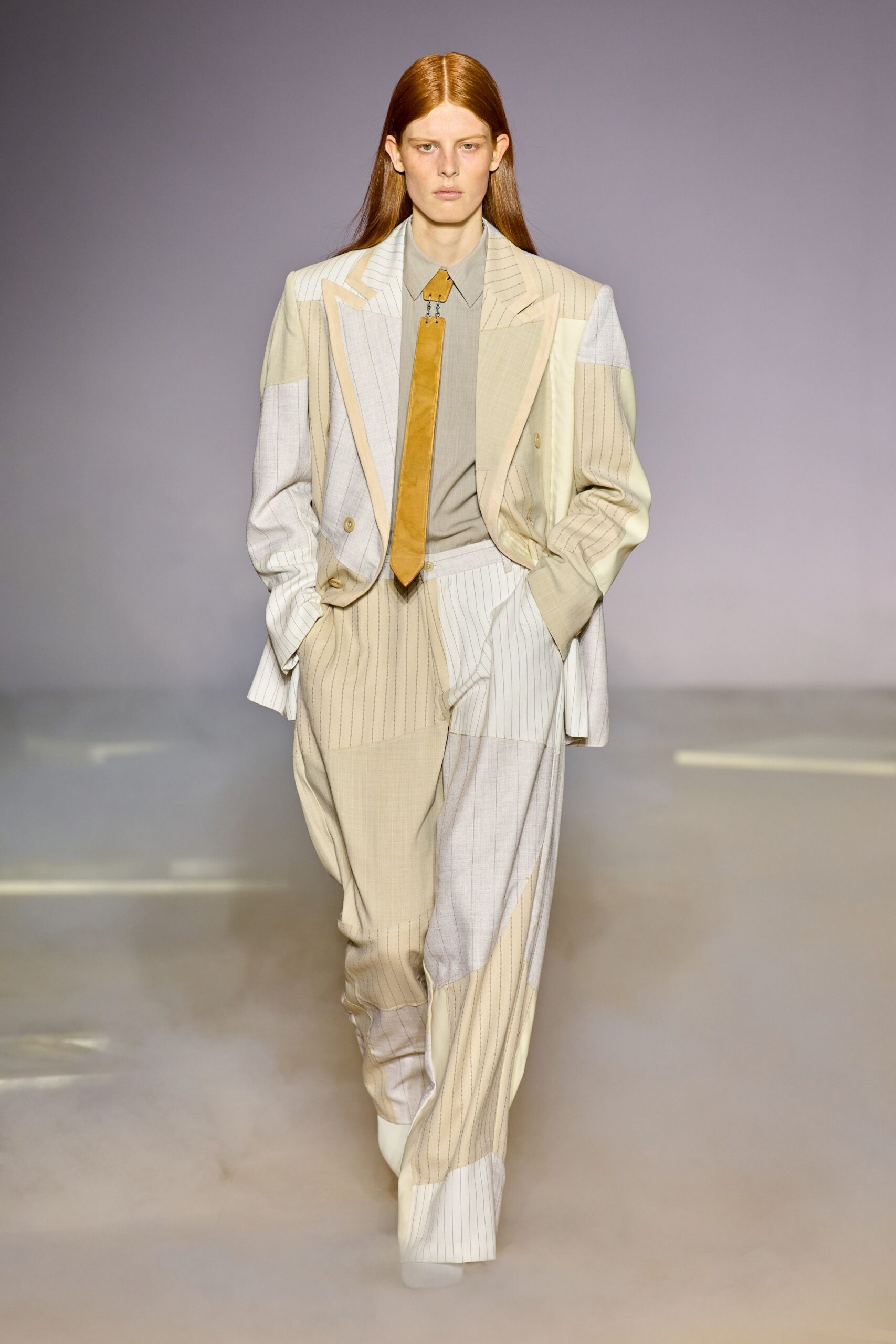 beige gray tailored suit with tie
