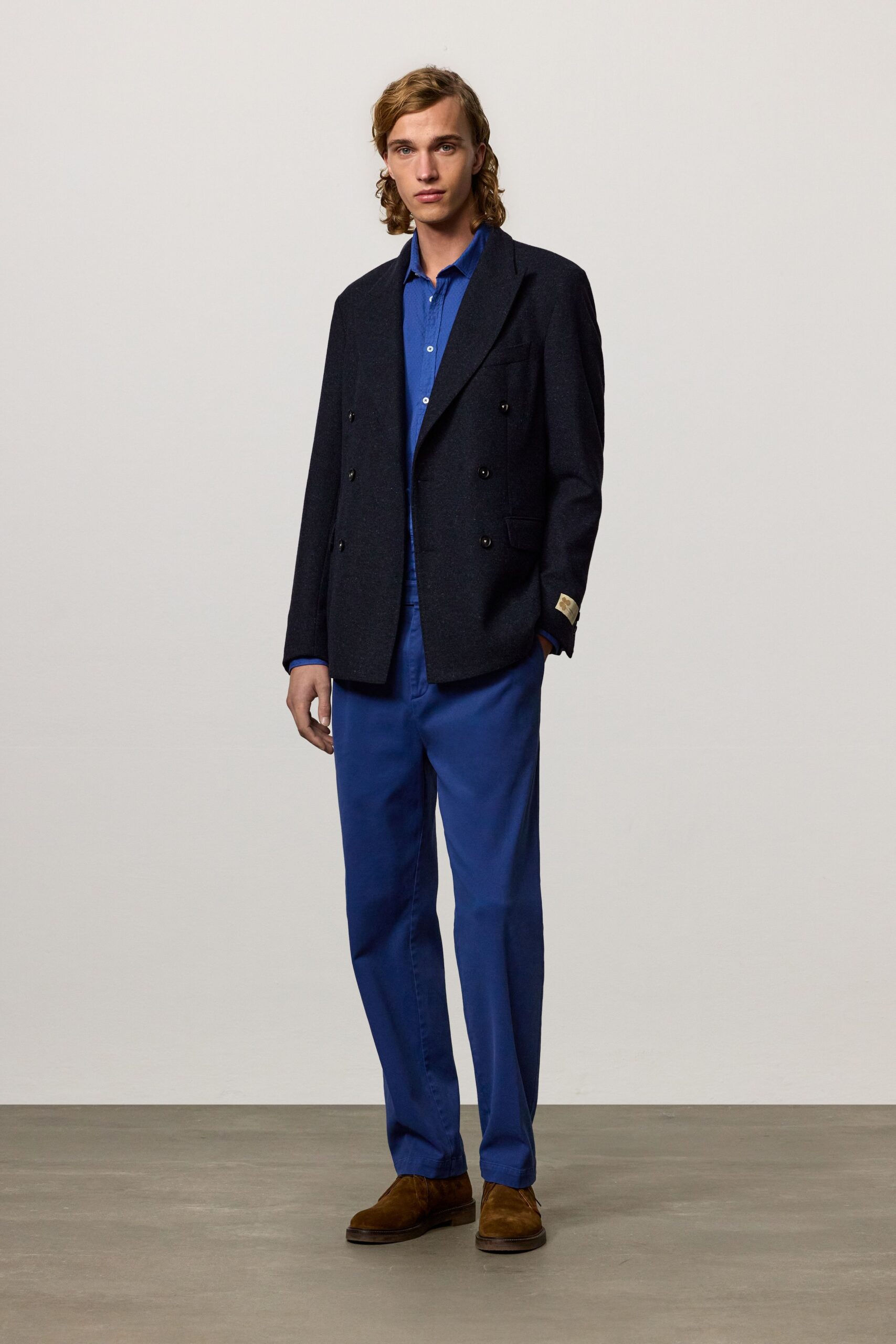 black blazer blue shirt tailored pants