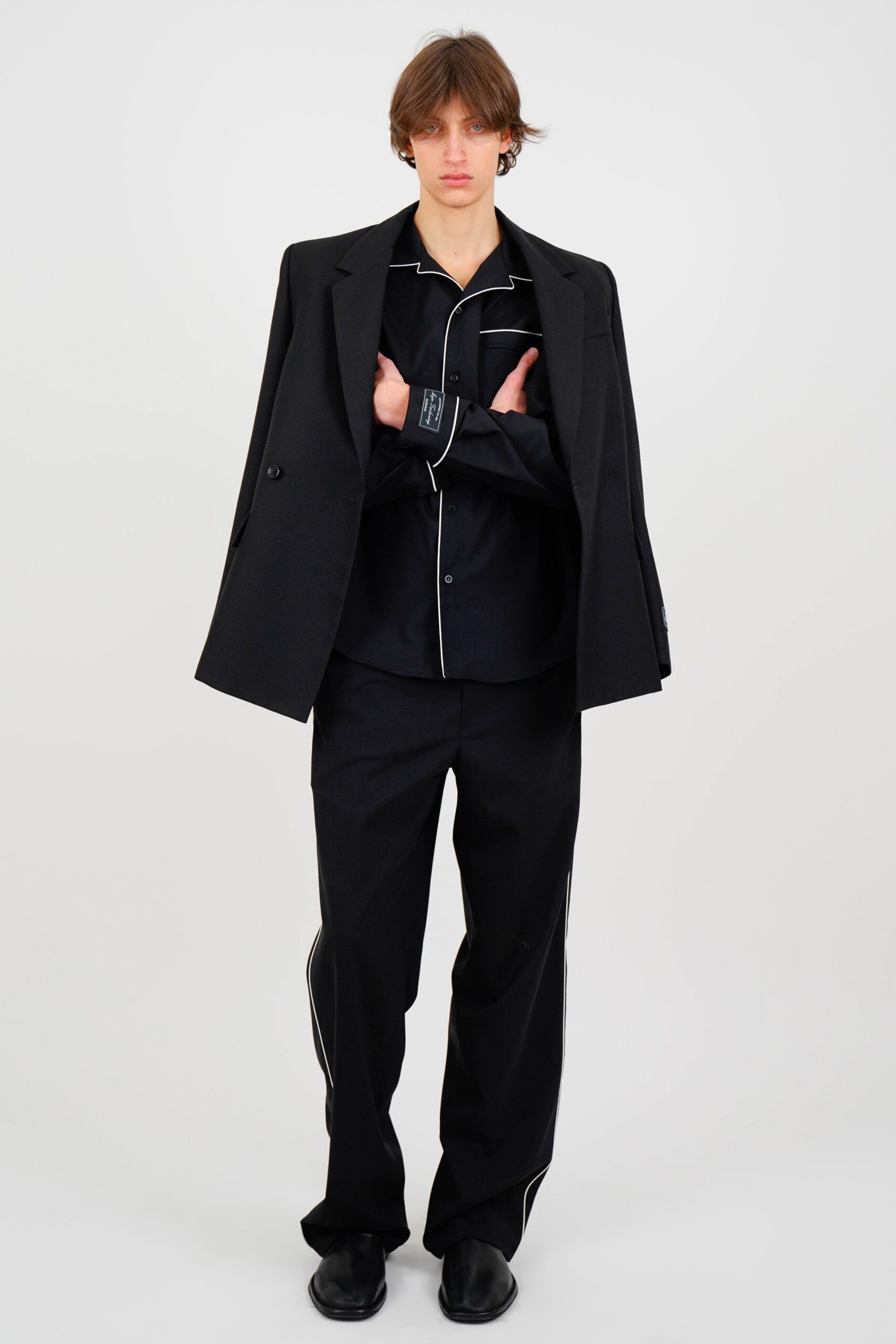 black tailored blazer and shirt