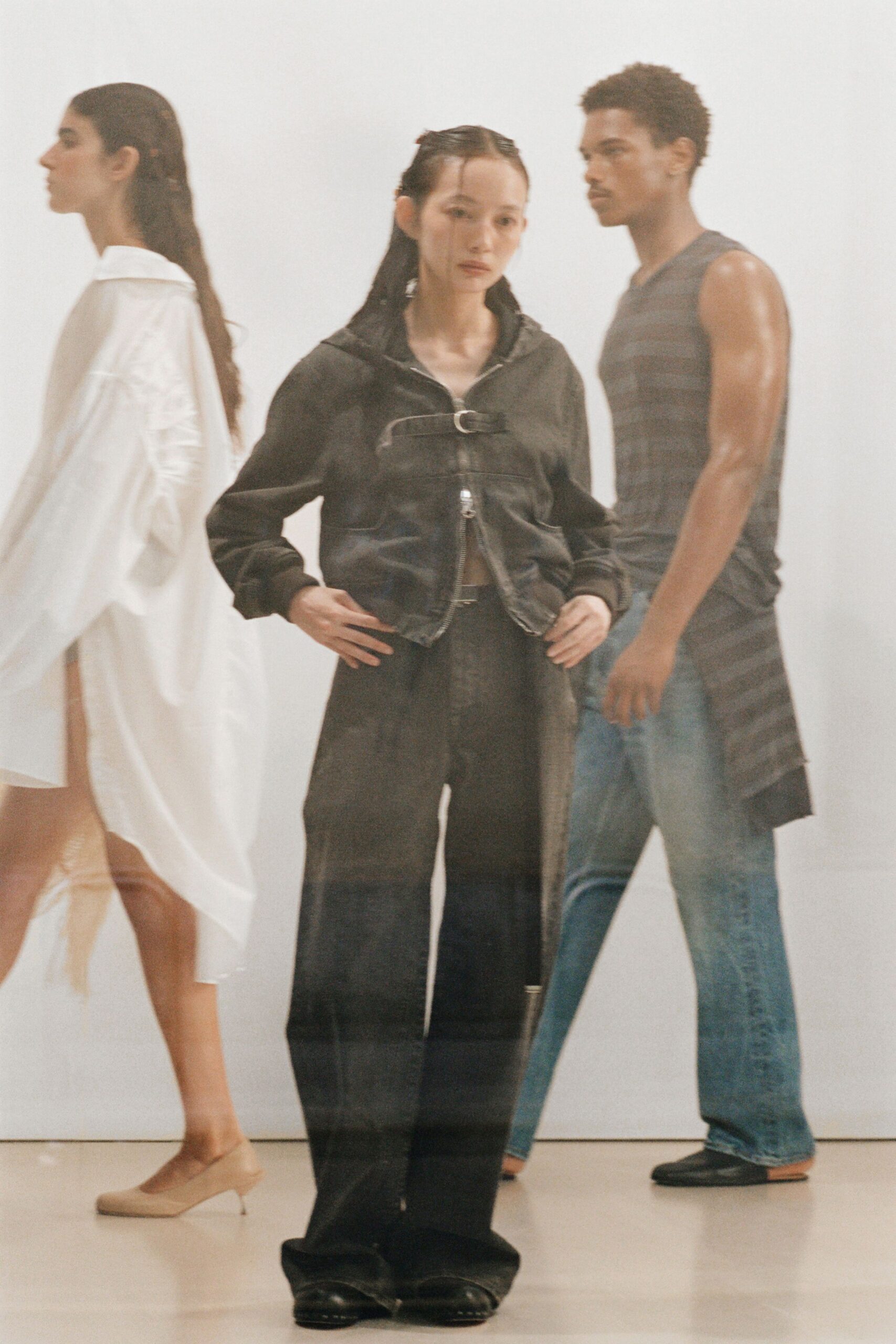 black denim jacket with relaxed pants
